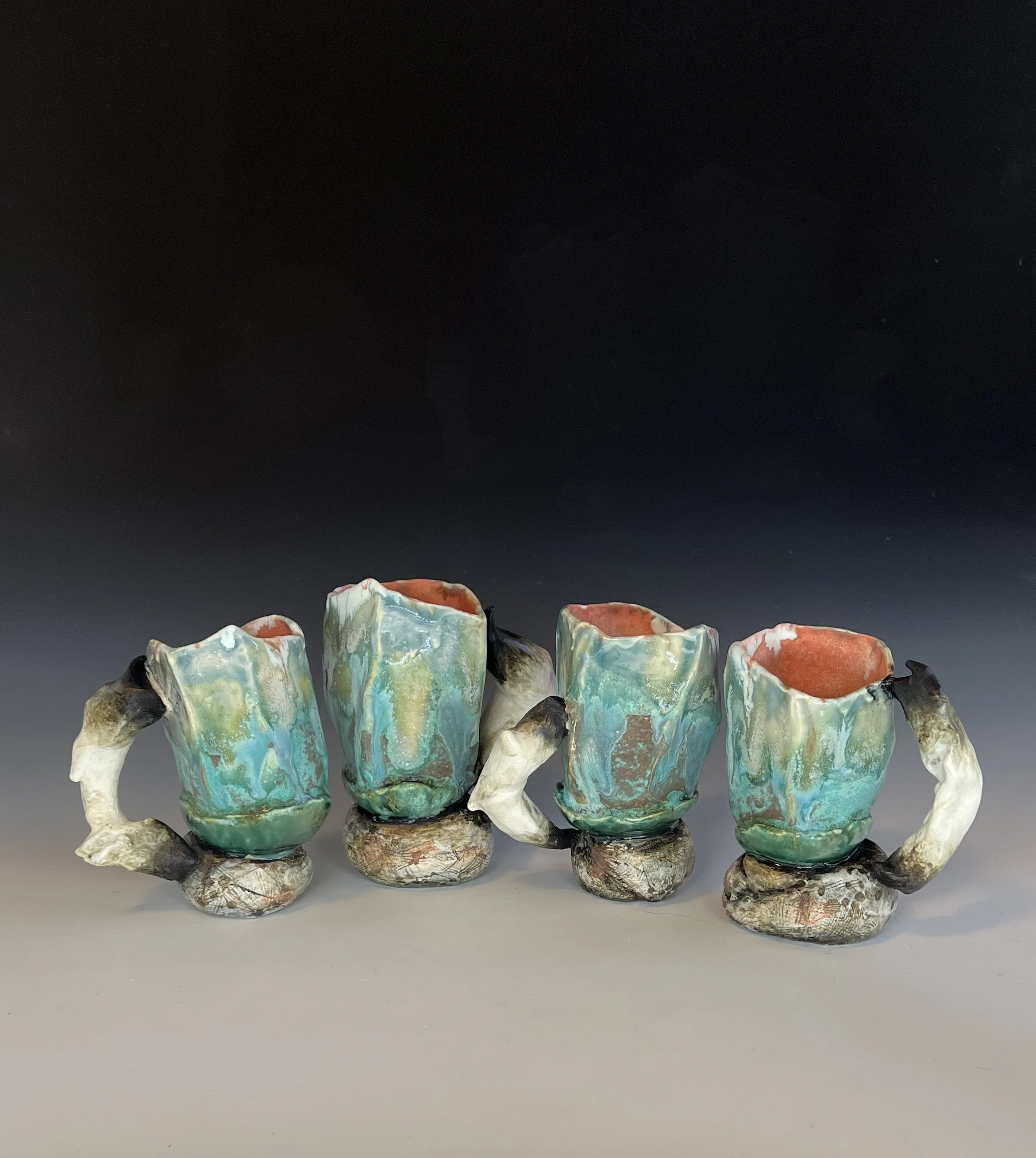 Four Elements Cups, 2026. Handbuilt, glazes, underglaze, slip