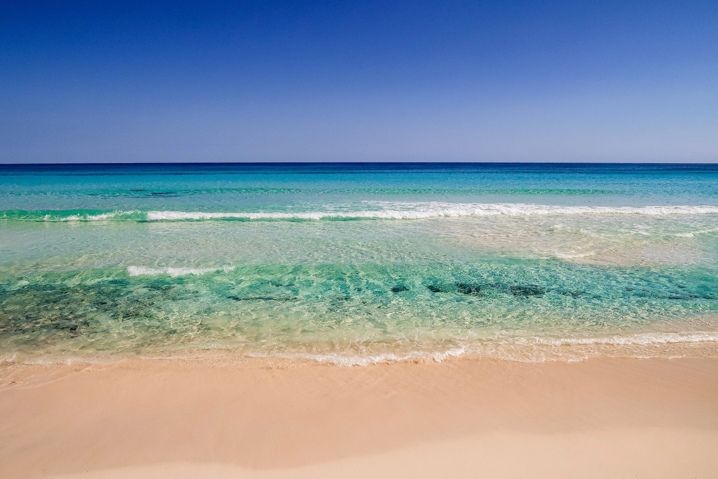 Turquoise Caribbean Sea and rocky coastline on Cozumel, Mexico