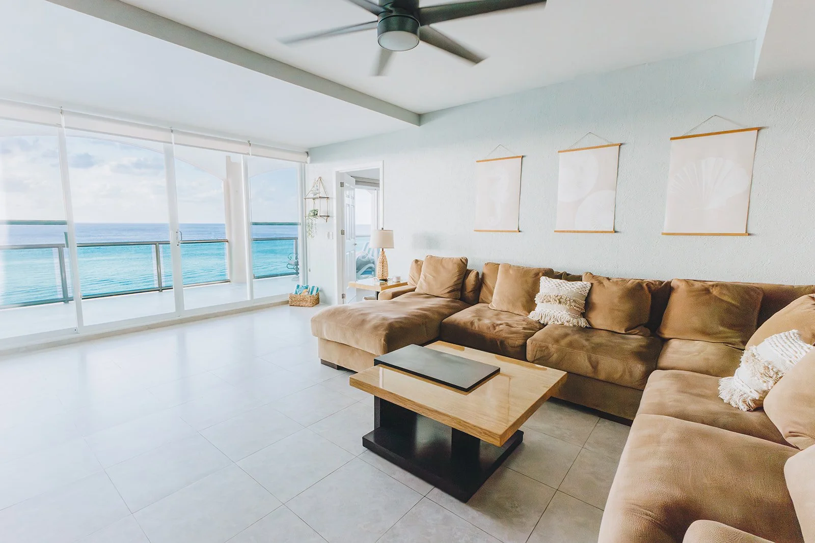 Living room overlooking the Caribbean Sea at El Cantil condo in Cozumel