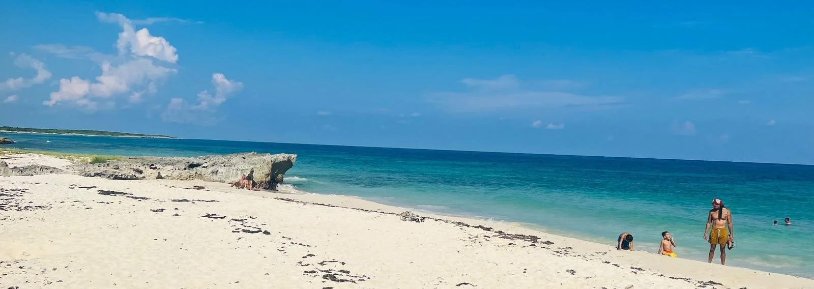 White sand beach along Cozumel's wild east side with turquoise Caribbean water