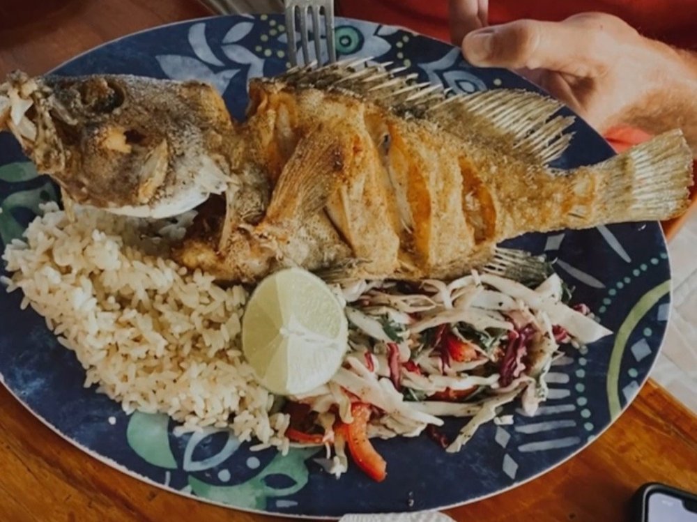 Plate of freshly fried whole fish served at Pescaderia San Carlos in Cozumel.