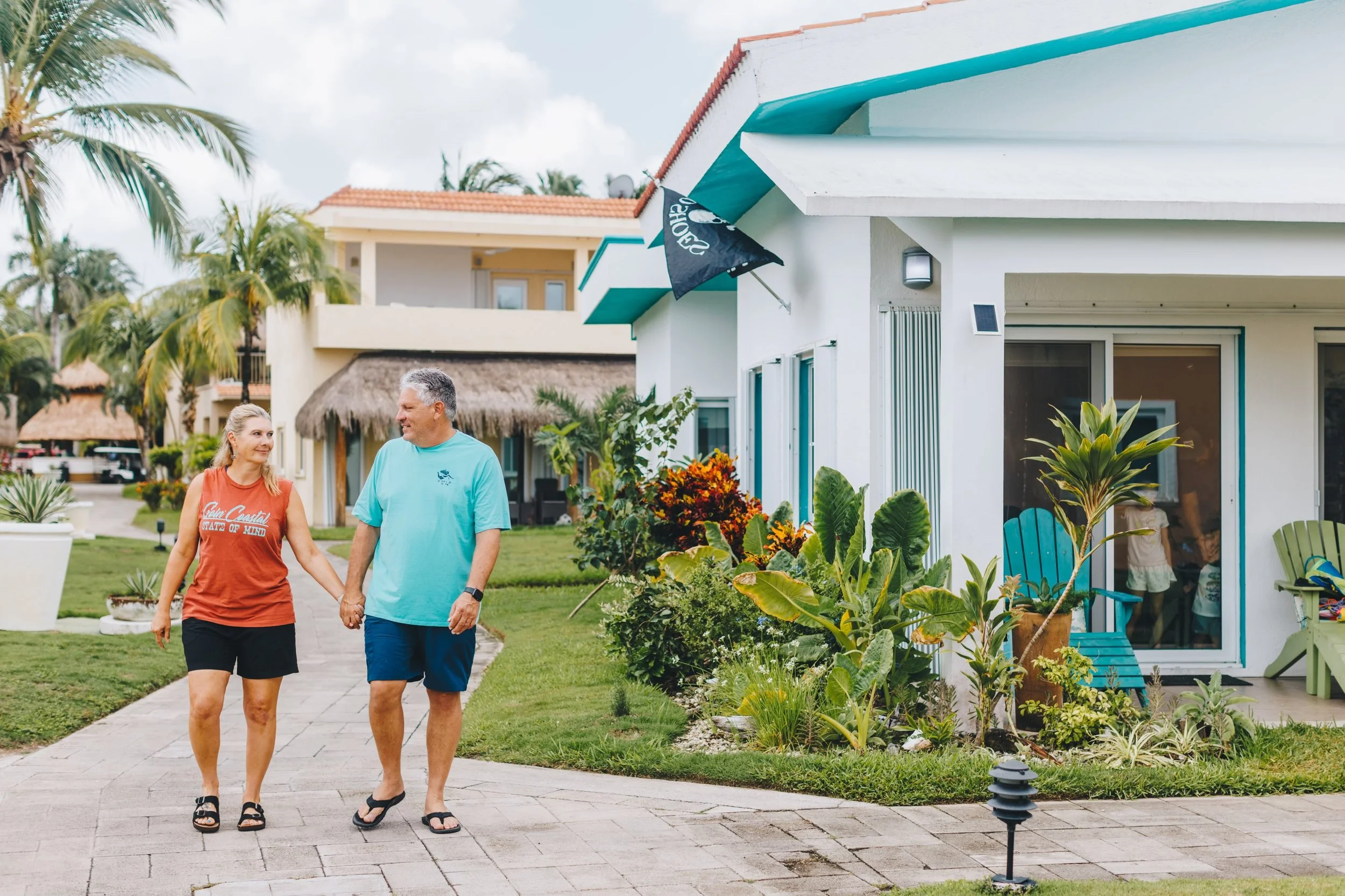 Dory and Jeff, owners of We've Gone Coastal, sharing their love of Cozumel and helping guests plan unforgettable vacations.