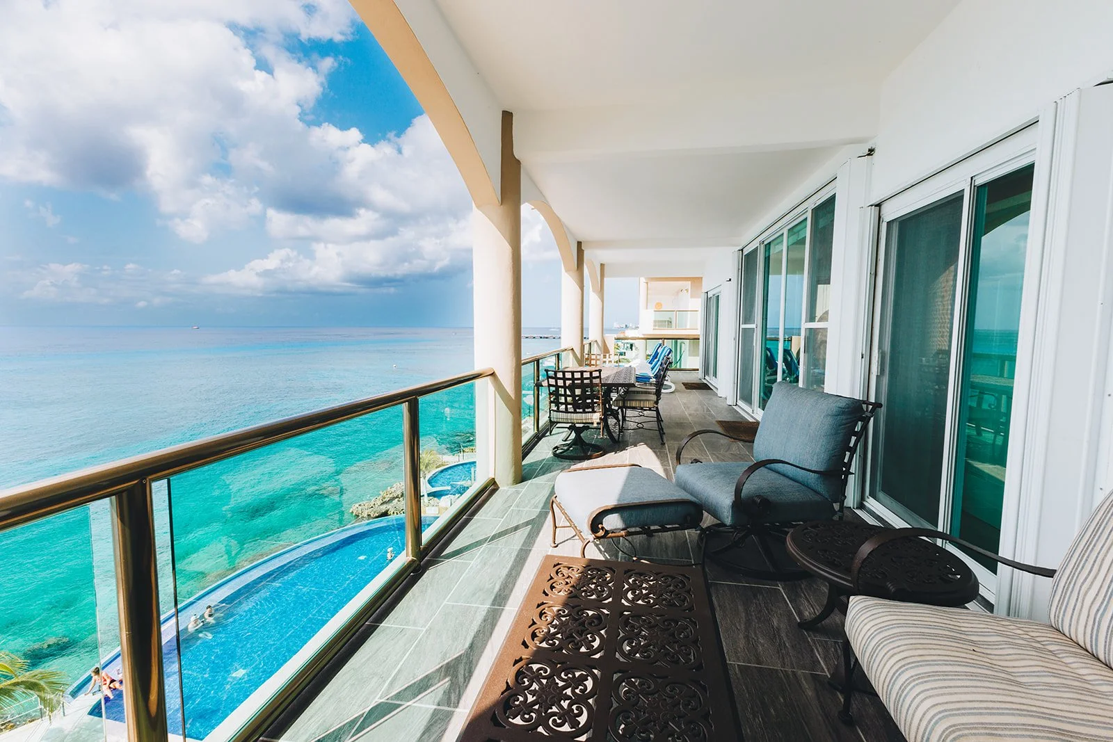Caribbean Sea and pool view from our El Cantil condo balcony in Cozumel