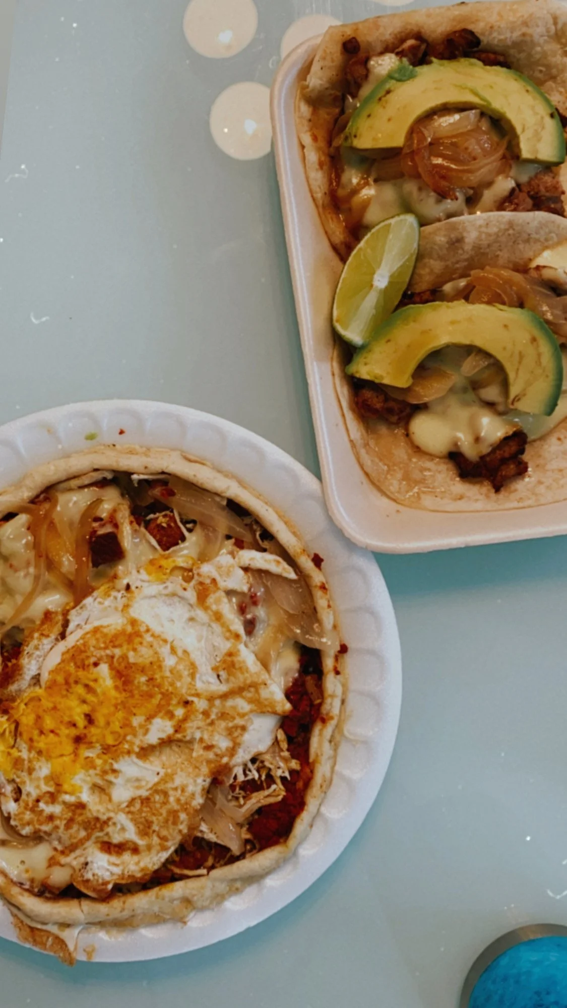 Traditional Mexican breakfast at Doña Chely in Cozumel – fresh chilaquiles with eggs and avocado