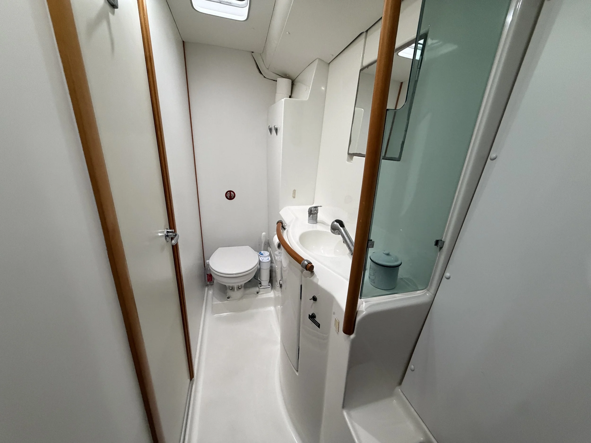 Port-side head and shower amidships.