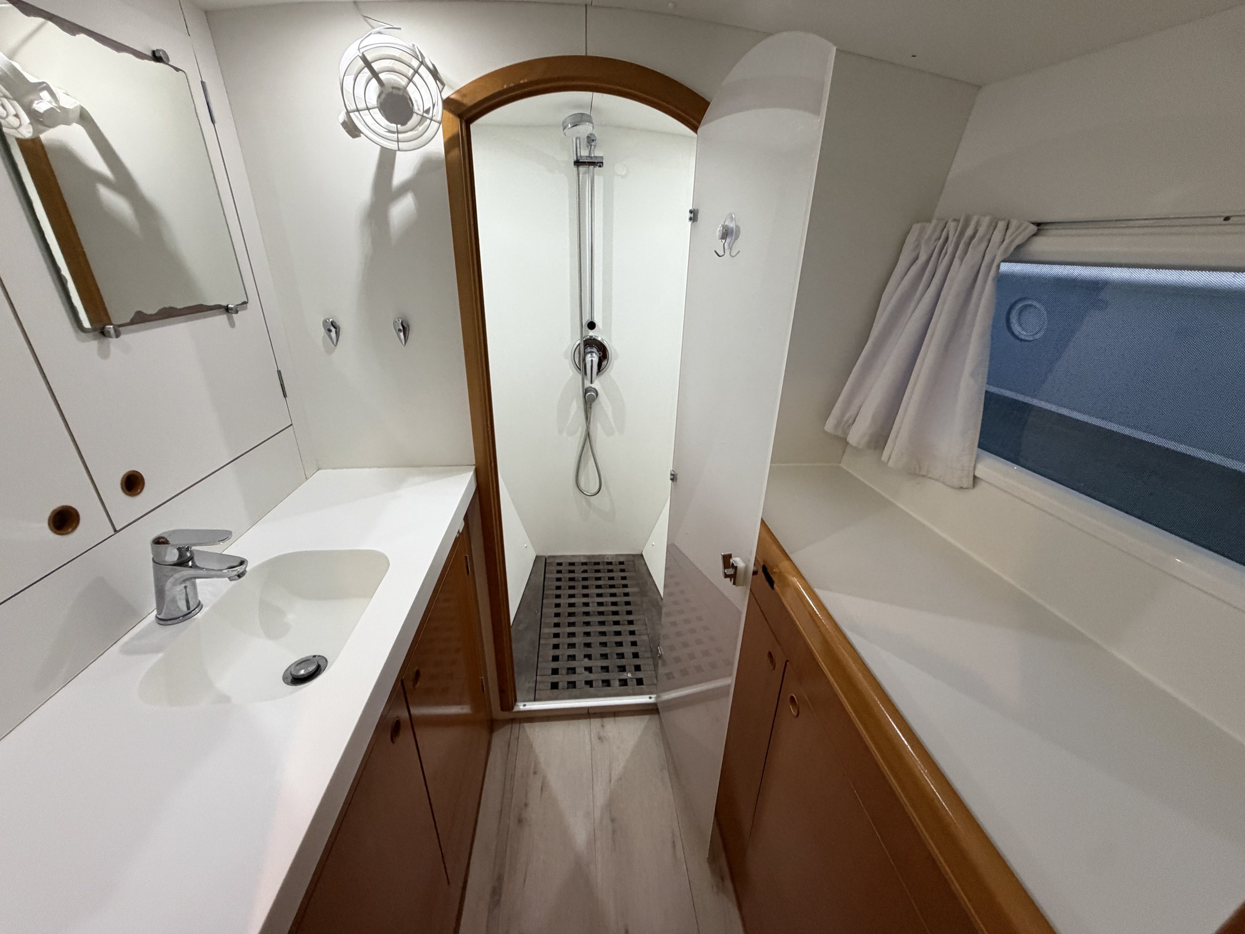 Owner’s bathroom with separate forward shower.