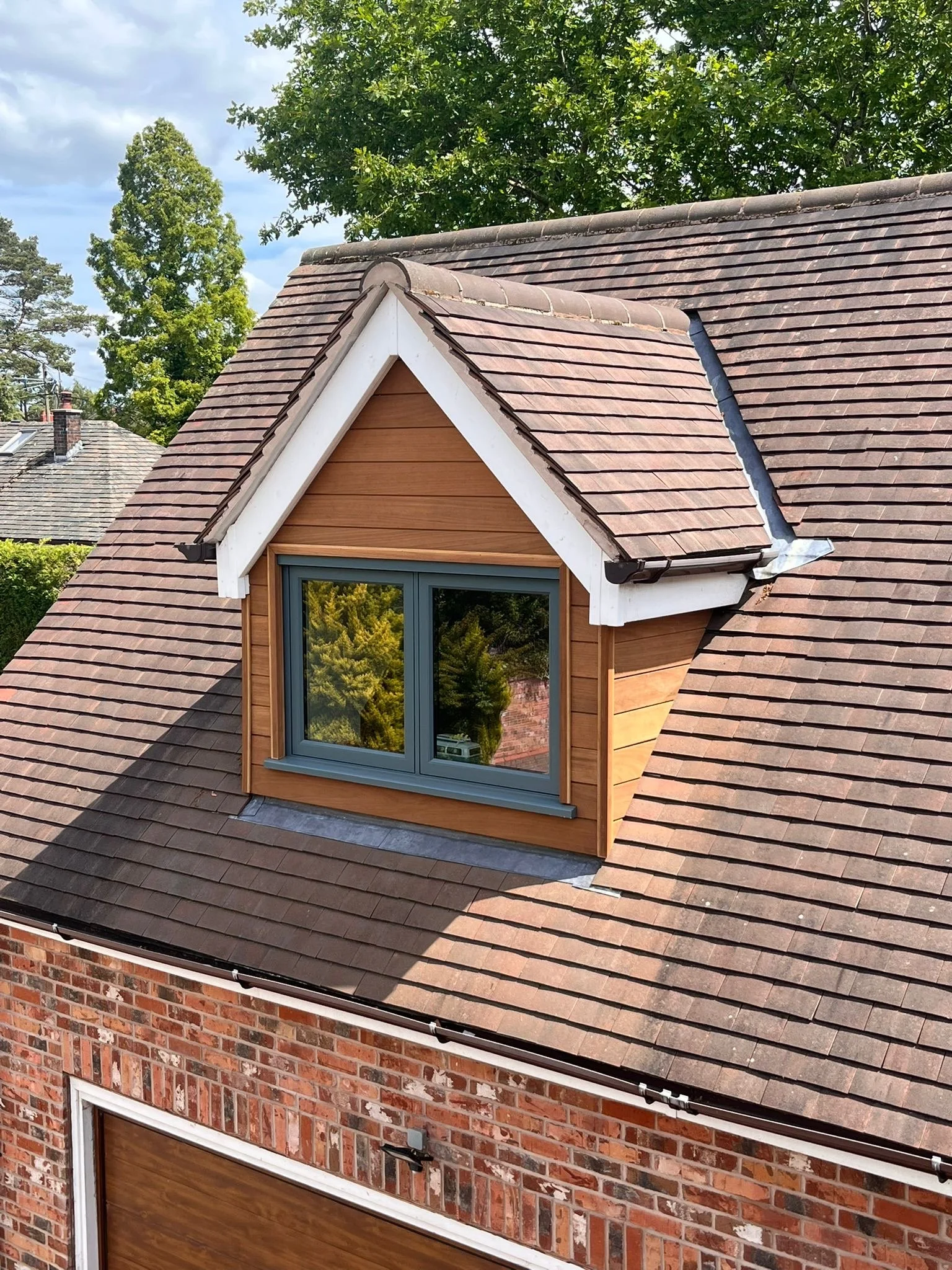 Dorma window with Thermo Ayous Timber Cladding