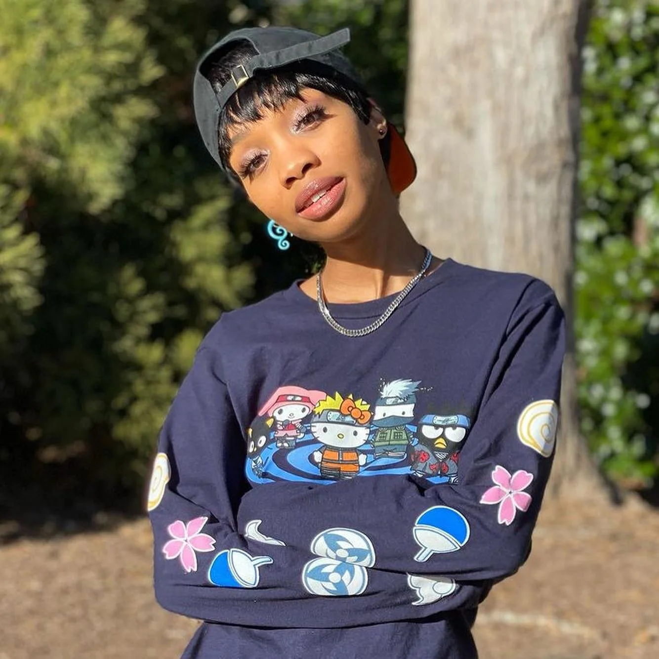@moniaashibi in our Naruto x Sanrio long sleeve😻 find yours at @boxlunchgifts 

#bioworld #naruto #sanrio #hellokitty #anime #ootd