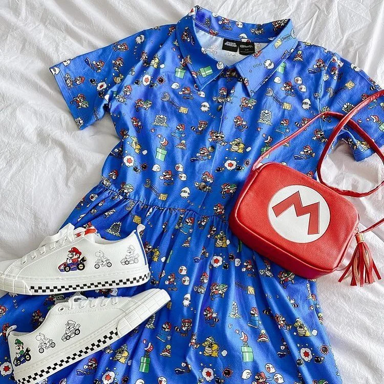 IT&rsquo;S MAR10 DAY! What are you guys wearing!? @abitwong completes her look with our Mario crossbody💙❤️

#bioworld #mario #marioday #ootd #nintendo #supermario
