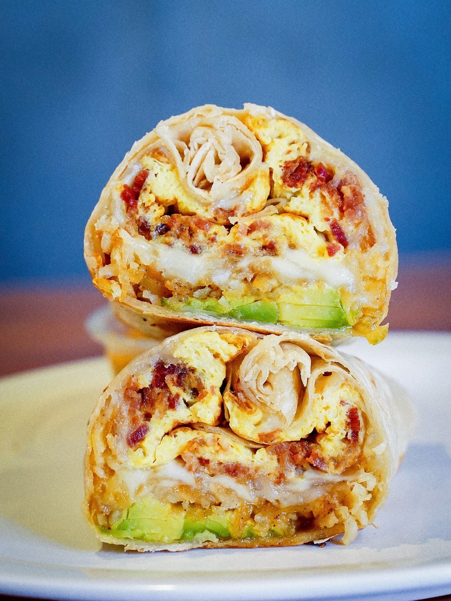 The best way to start your Tuesday is with our Bases Loaded Breakfast Burrito 🍳🥓☀️