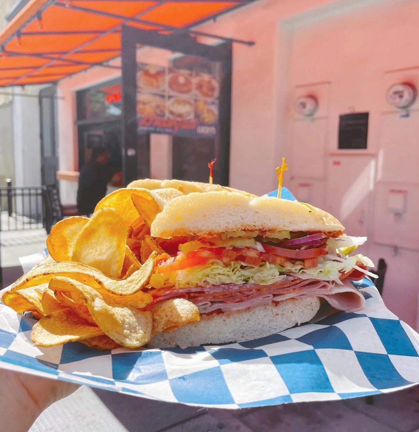Skip the sad desk lunch and come get an overstuffed sandwich instead 🥪