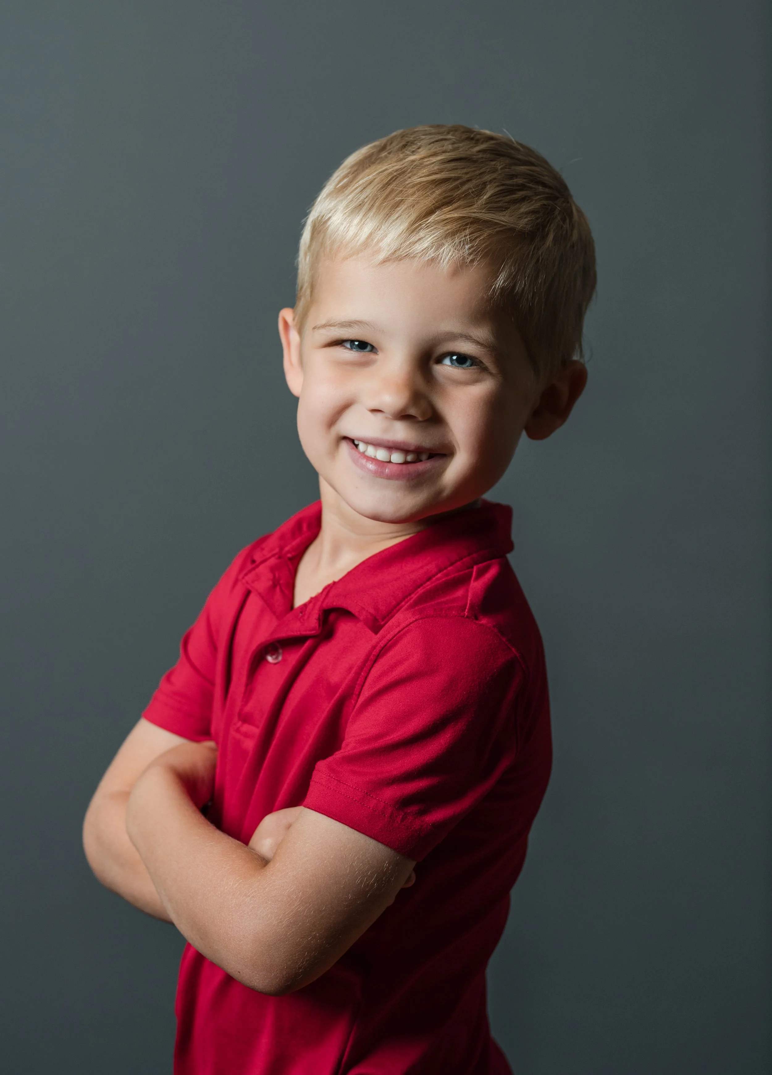 Child enjoying a relaxed school portrait session with a school photographer in NC