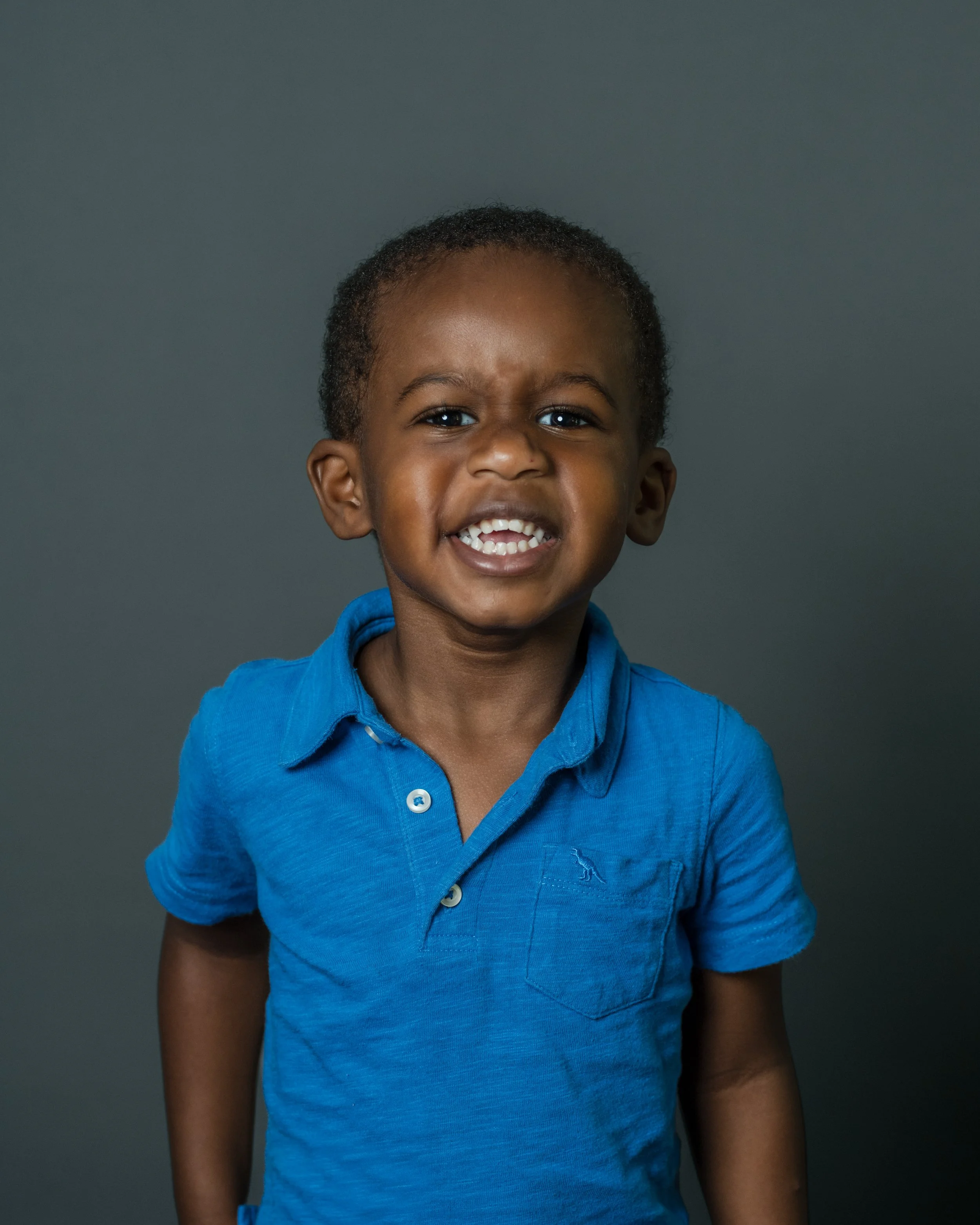 Child enjoying a relaxed school portrait session with a school photographer in NC