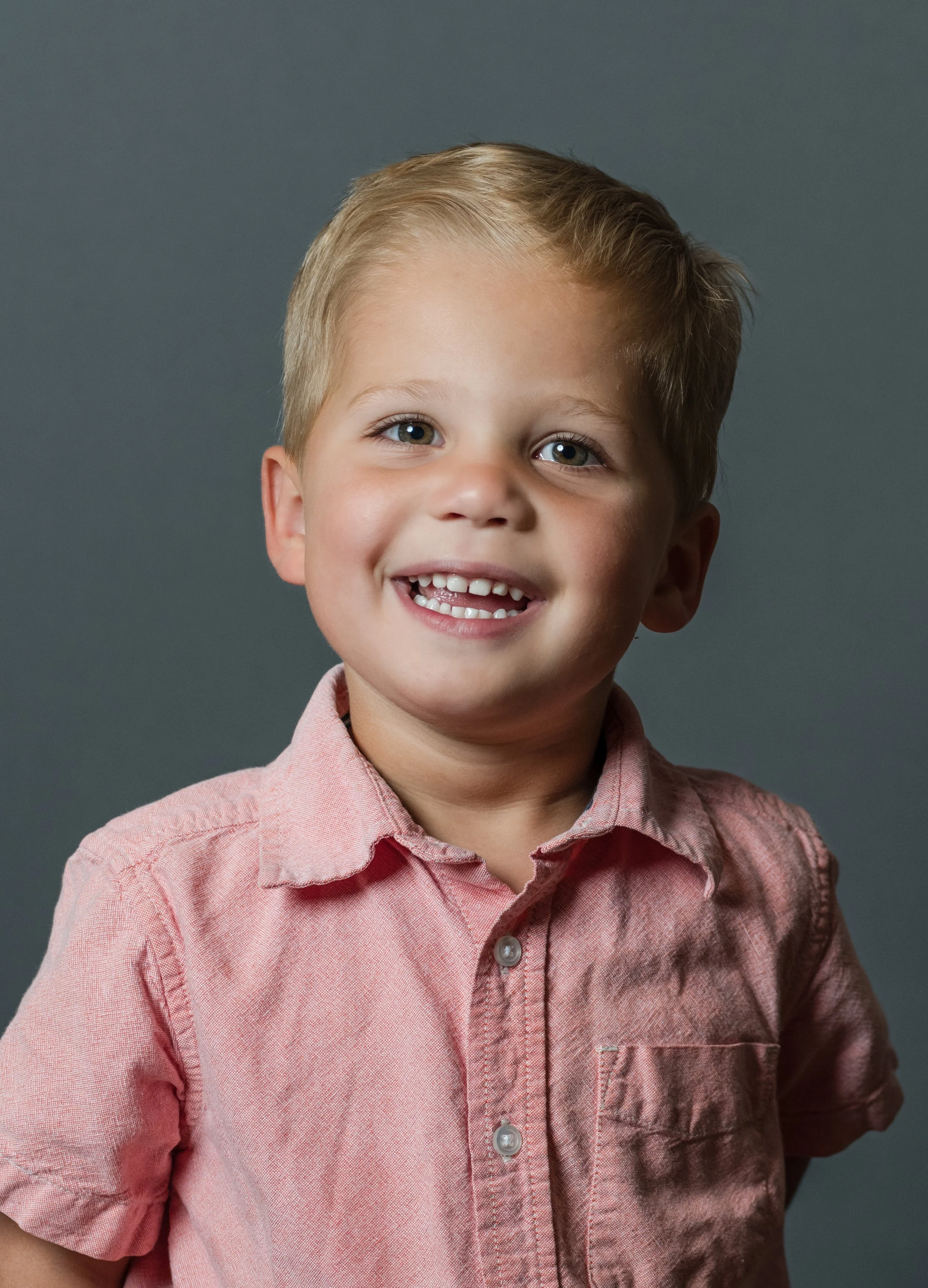 School photographer capturing student portraits during picture day in Raleigh NC
