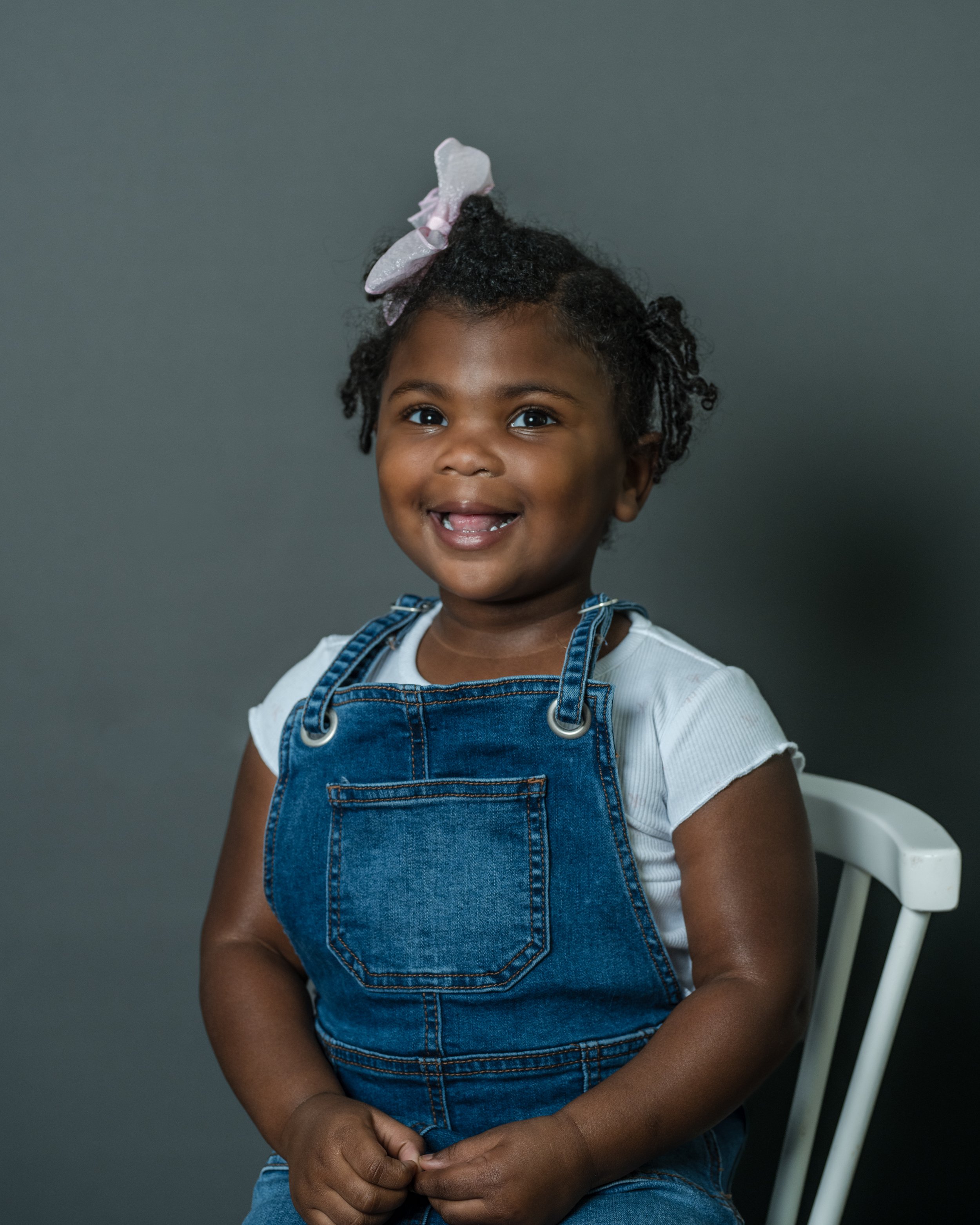 Child enjoying a relaxed school portrait session with a school photographer in NC