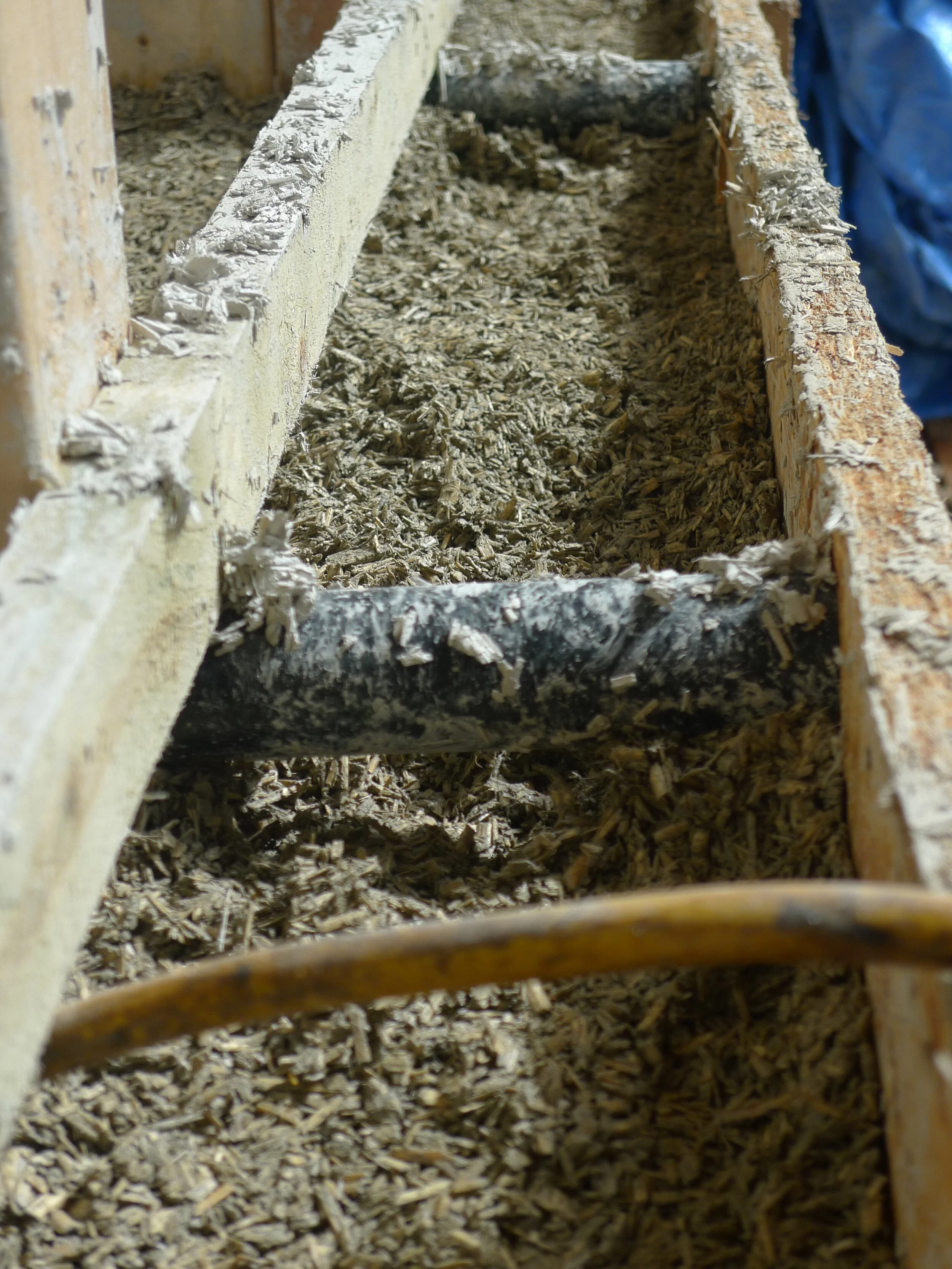 batten fixed to stud to give the hempcrete a key and pipe spacer for shuttering