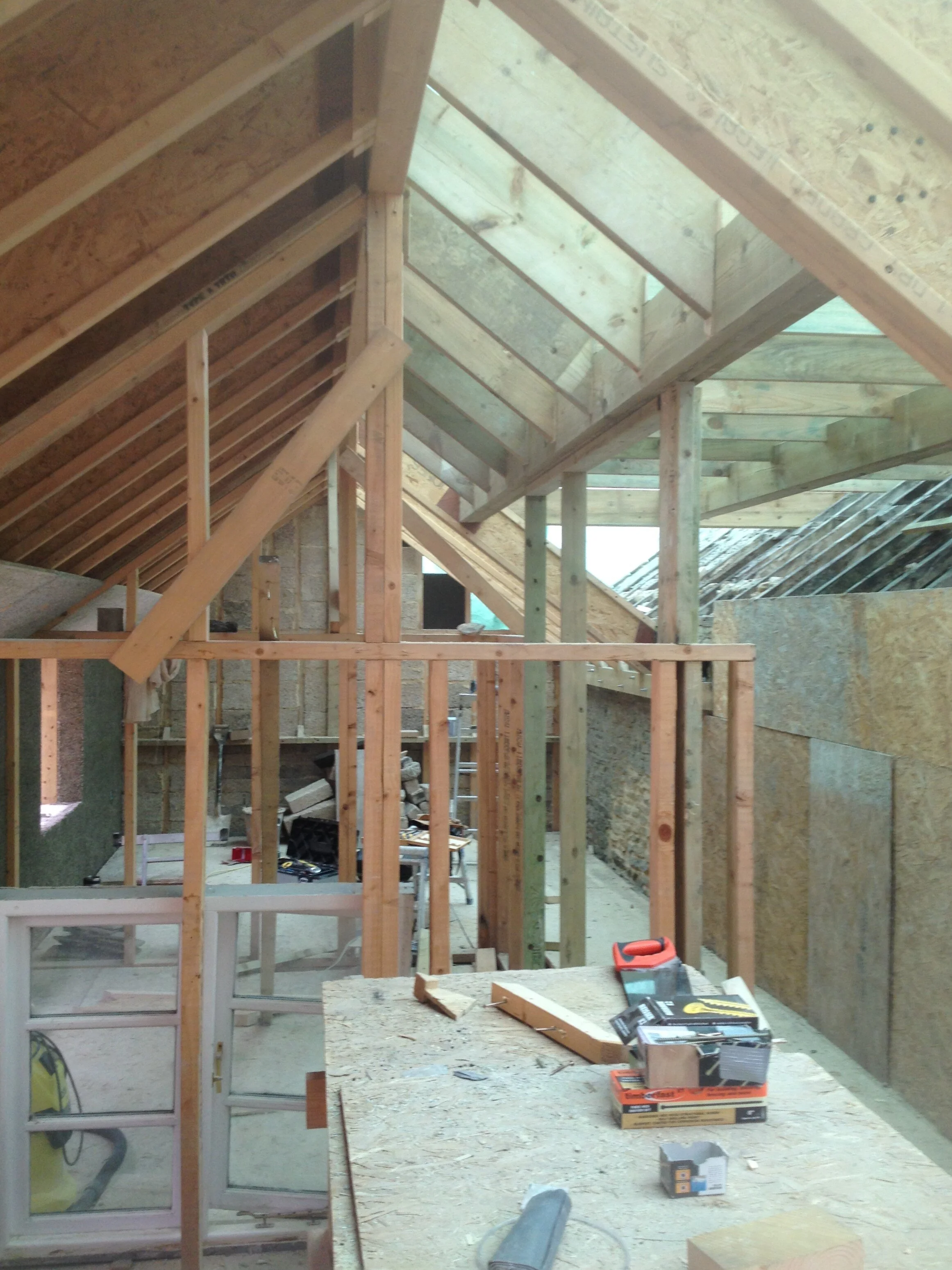 The rafters were timber I-joists, these are much lighter and easier to handle than solid timber and also create less of a cold bridge.