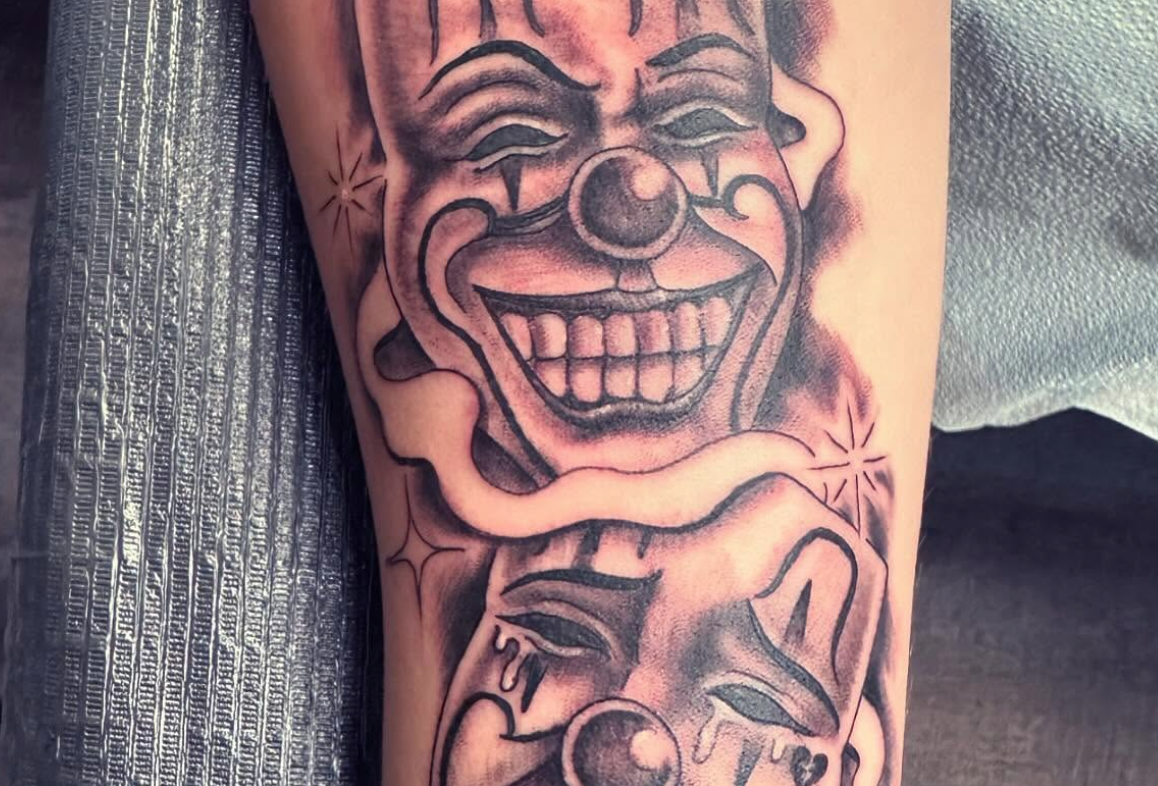 Happy clown sad clown by Dennis Escalante