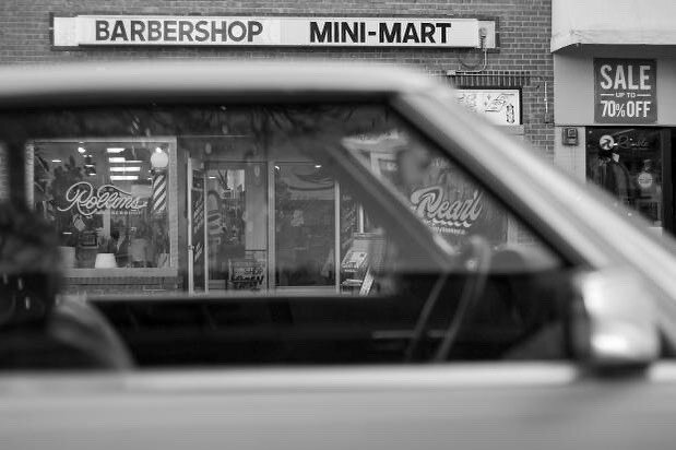 Just trying to keep it real. Beautiful moment captured by @unboxed.photography 
.
.
#bouldercolorado #branding #boulderbusiness #pearlstreetboulder #signpainting #americana #folkart #clerks #cornerstore #bodega #blackandwhitephotography