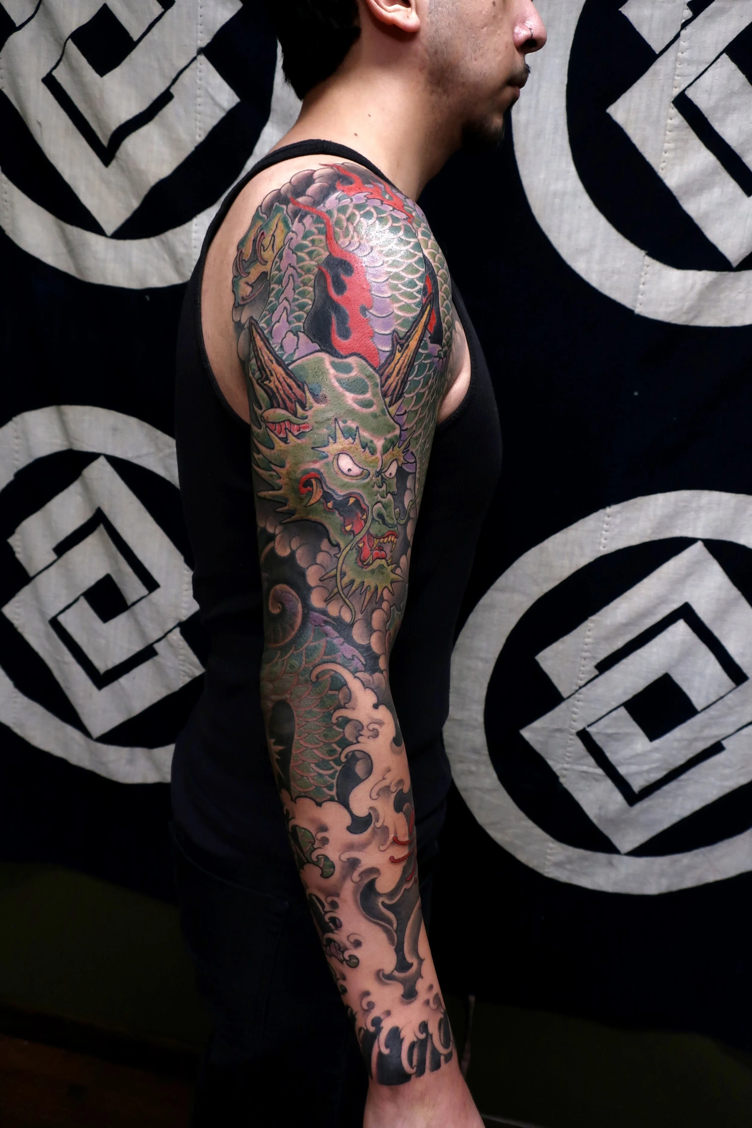 Traditional Japanese Dragon sleeve with water background in color by Austin Tattoo Artist