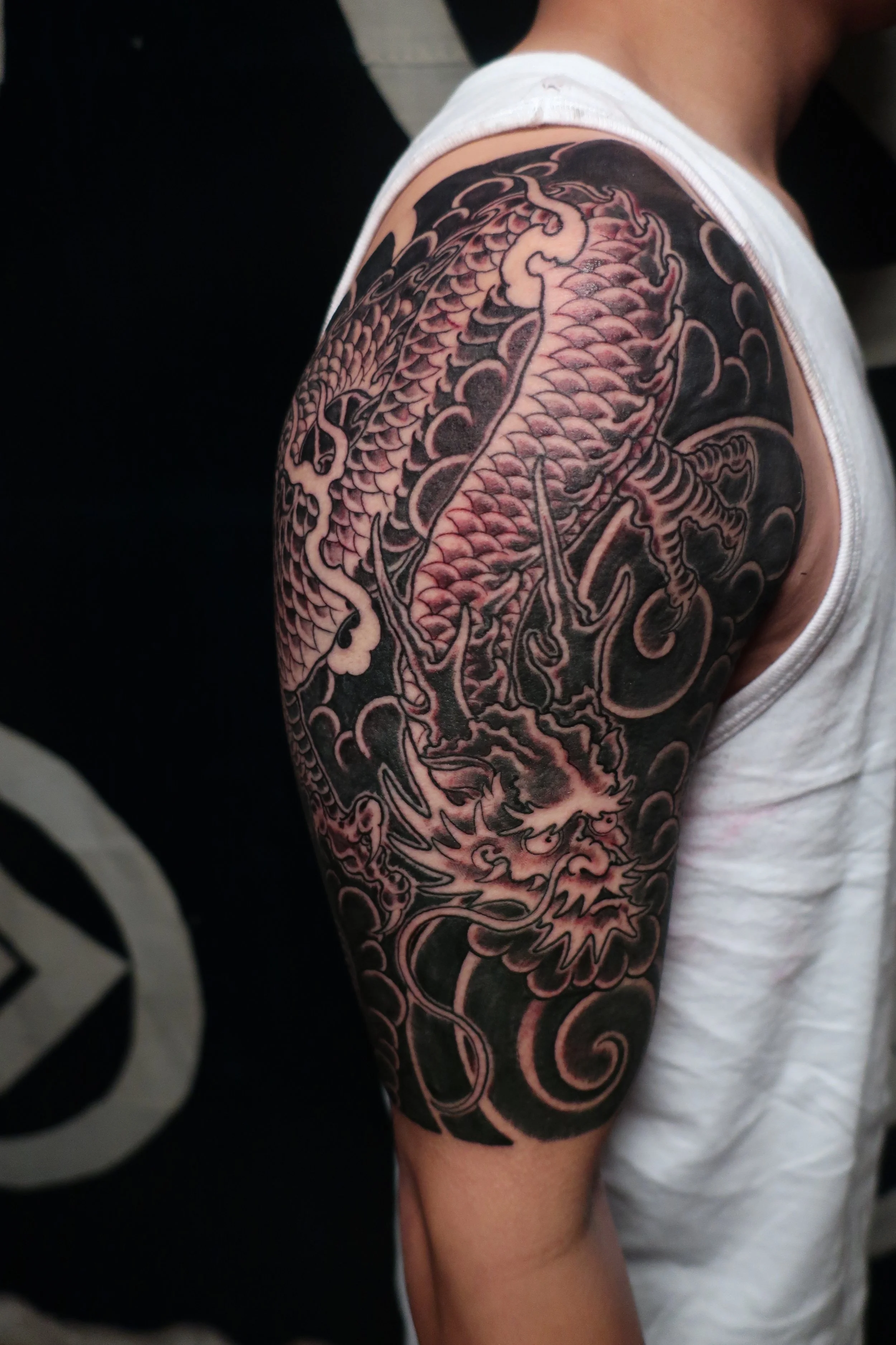 Shoulder capped Japanese half sleeve with dragon and clouds