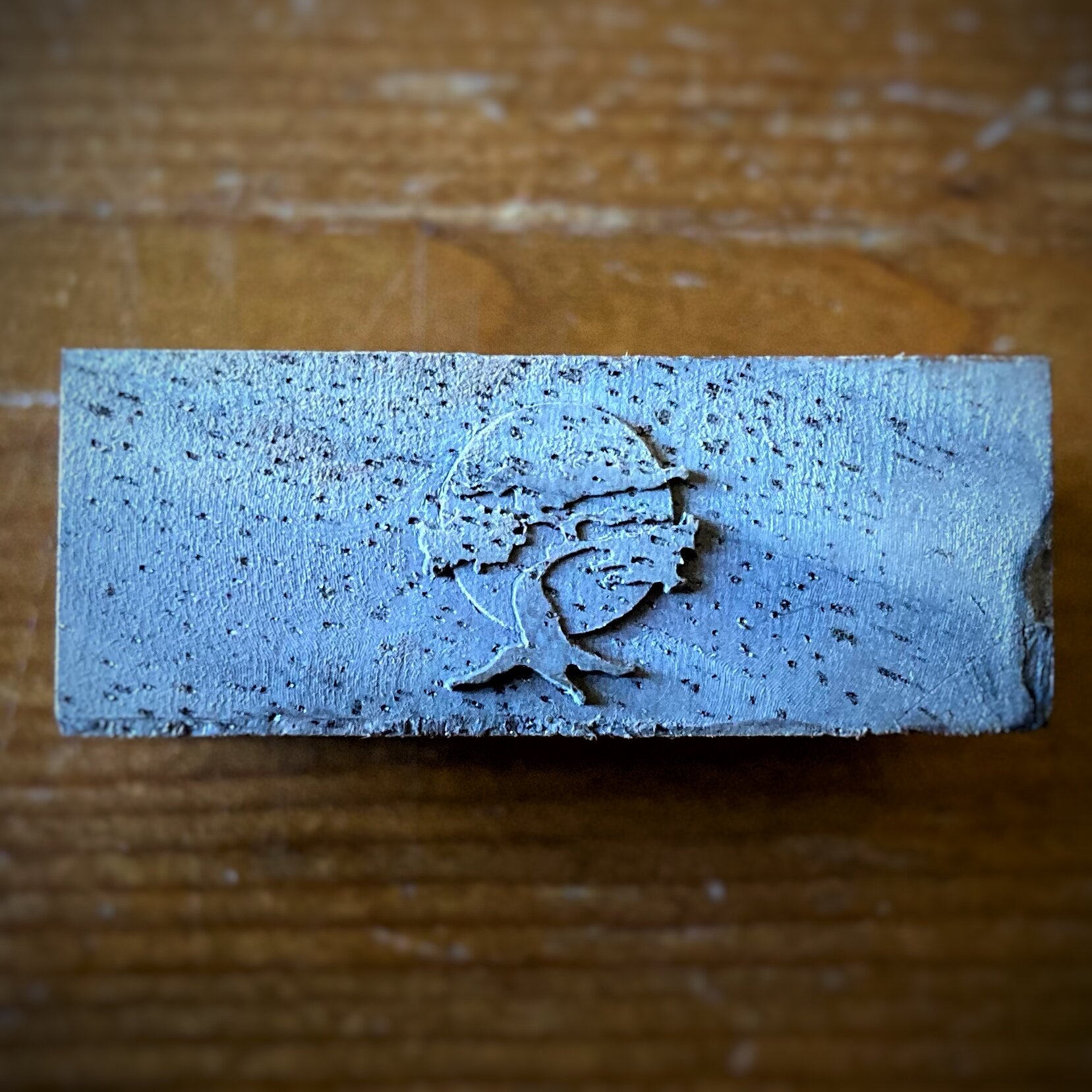 The Miyagi-Do Bonsai. Walnut wood. Very small... I had to use a microscope and a scalpel to clean out any rough edges and stuck dust.