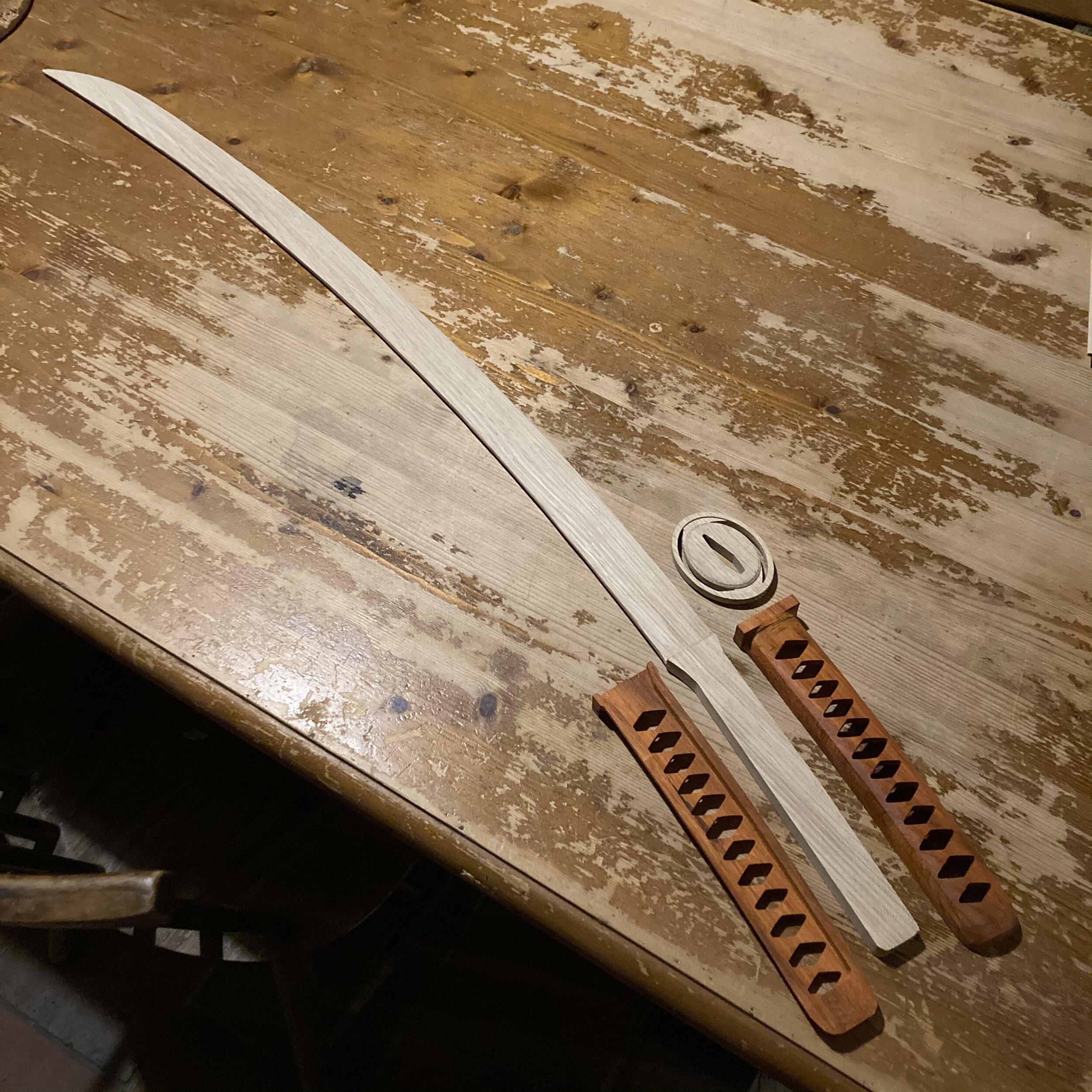 Basic blade and handle and guard, ready for a first try at assembly.