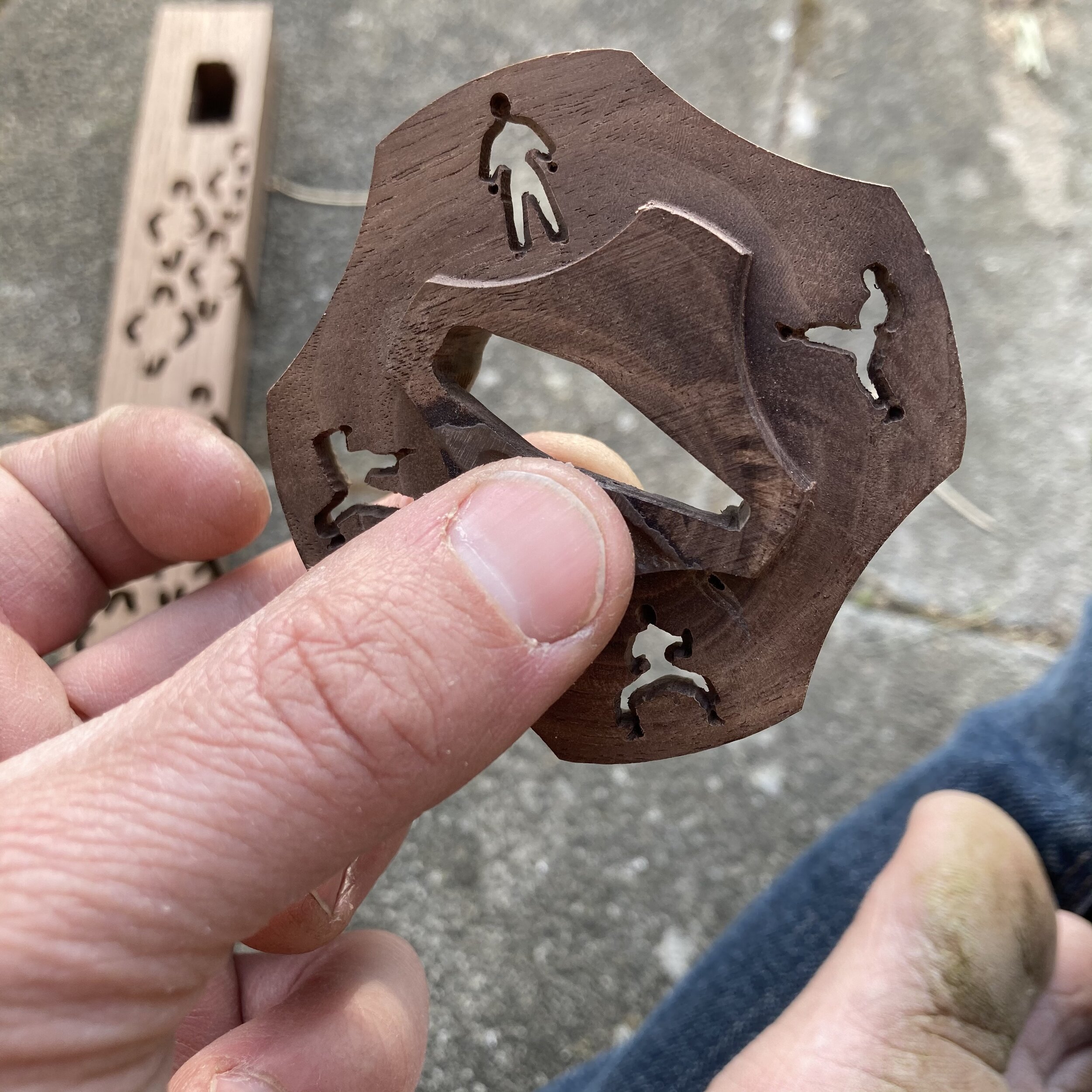 A better look at the Tsuba so you can see the little karate-dudes doing their thing. And yes, that is a very big and fairly dirty big toe there... I need to take better pictures.