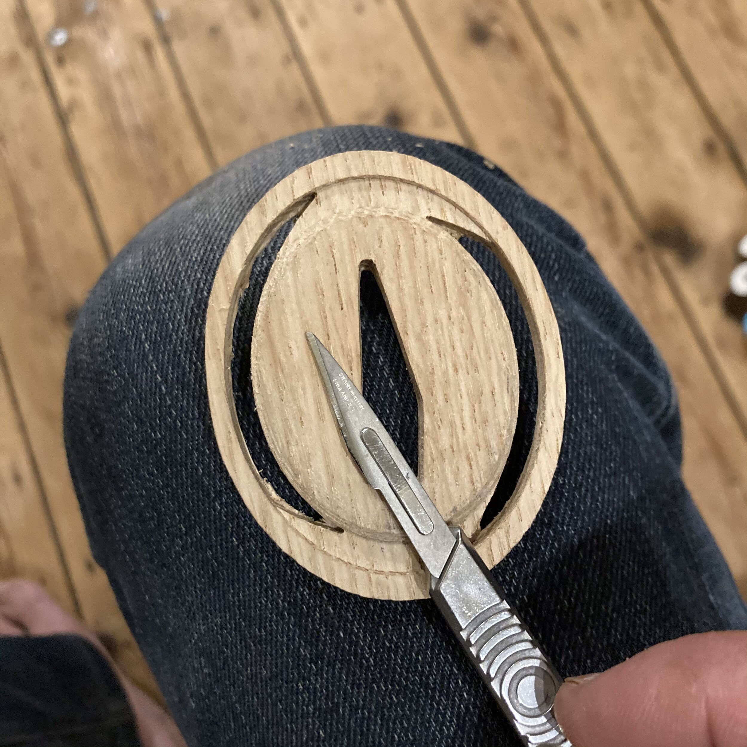 The Tsuba. Nice swirlyswirl in the edge. It sort of becomes quite fragile in certain direction. I guess I should've oriented it differently on the grain.