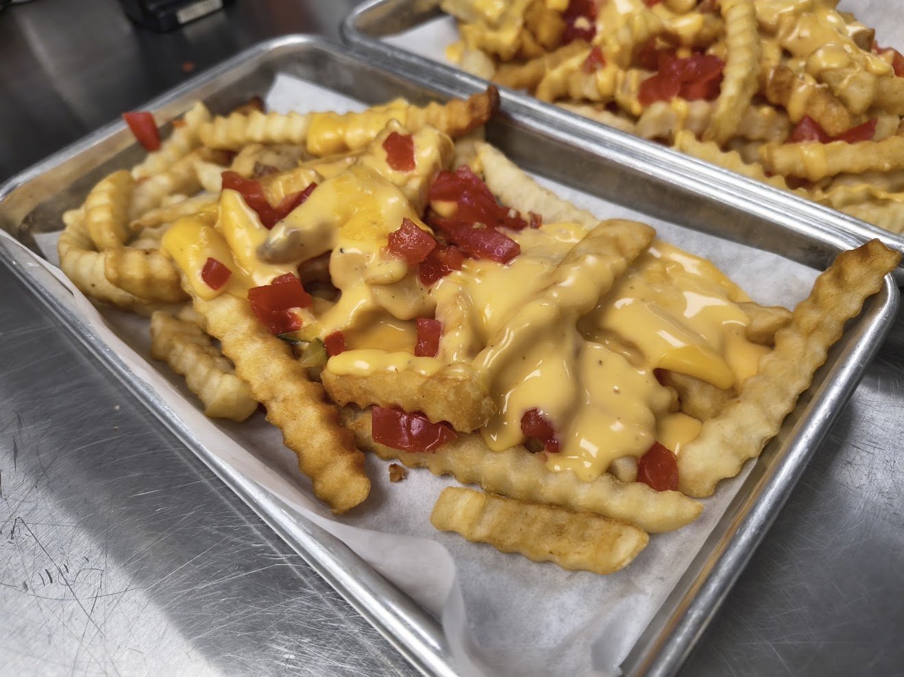 Loaded Fries with Tomatoes and cheese.jpg