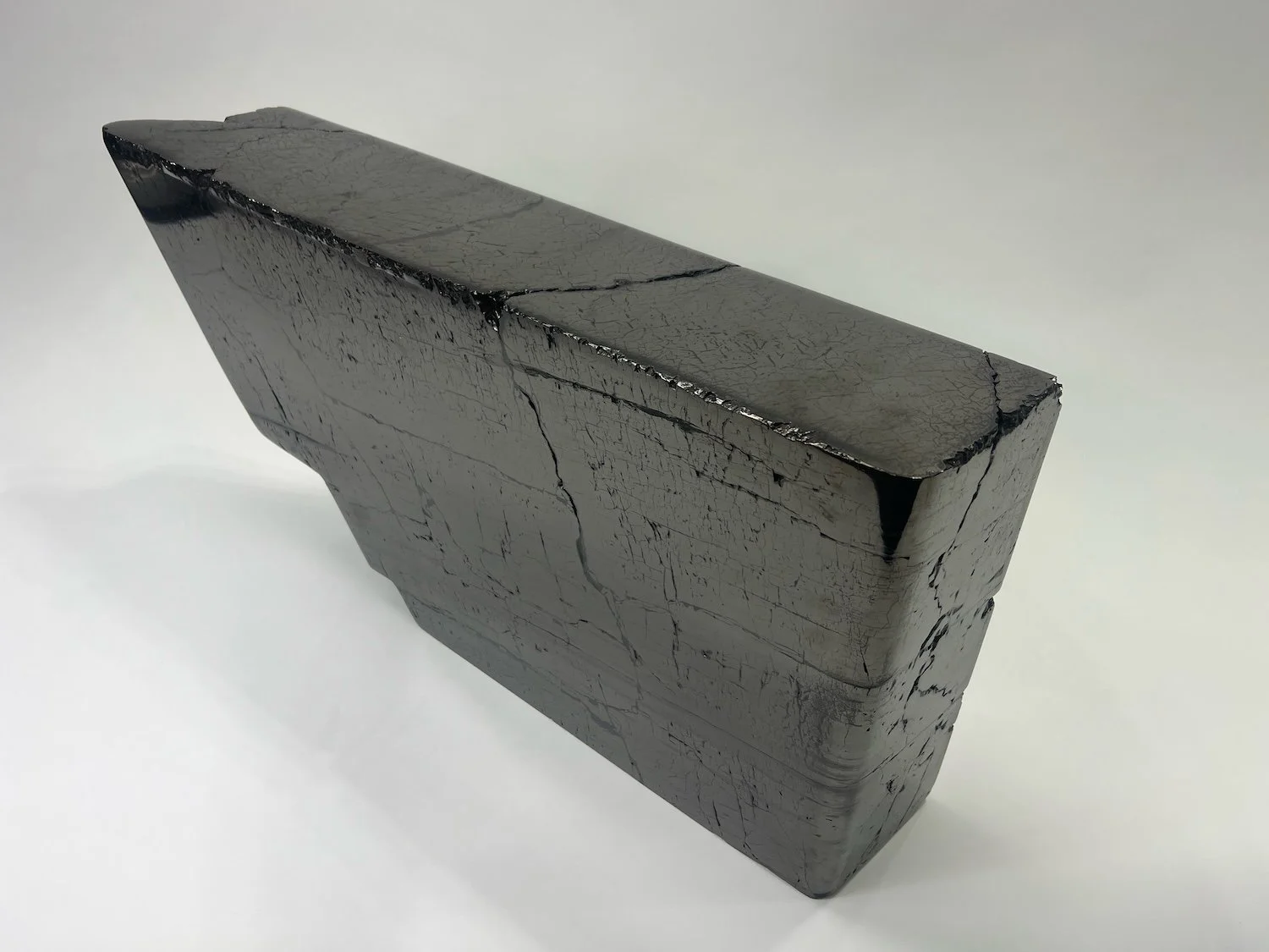 JIM ZIVIC Carbonem Sacrosanctum - Wall (side) | Polished coal | 30 by 6 by 17 inches | 2025