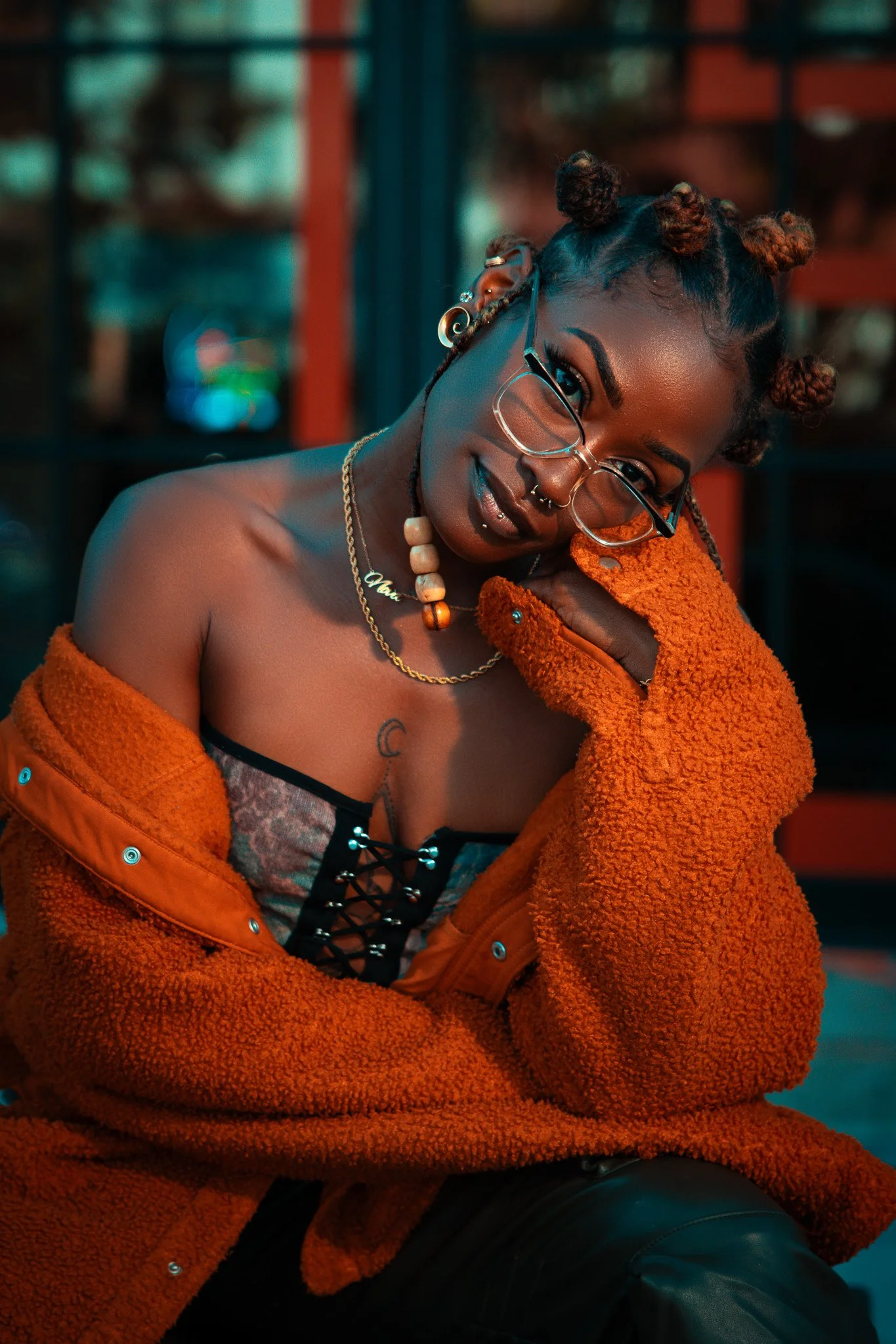 black women with orange sweater.jpg