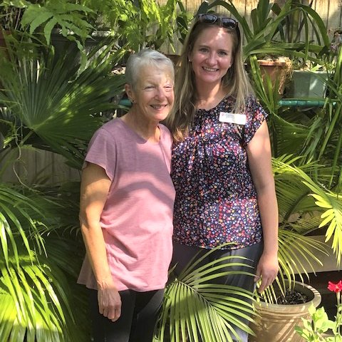 Deb with Katie Scherer, Director of Hilltop Garden and Nature Center.