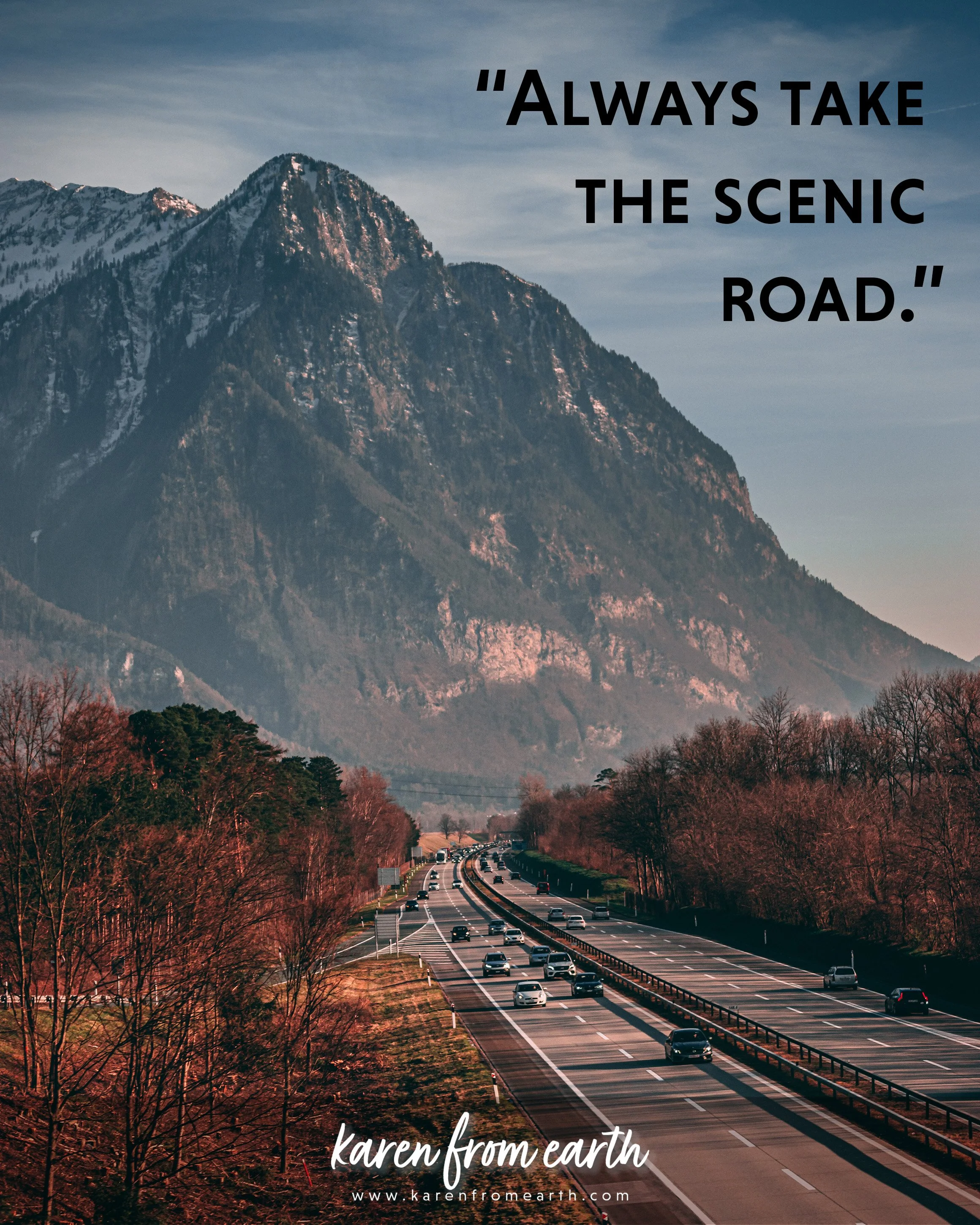 Travel quote about taking the scenic road over a photograph of a highway stretching toward dramatic mountains.