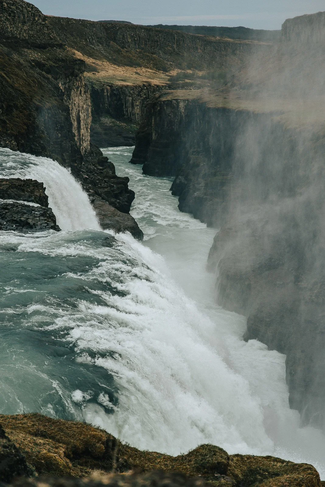 Close view of Gullfoss waterfall rushing into a rocky canyon in Iceland