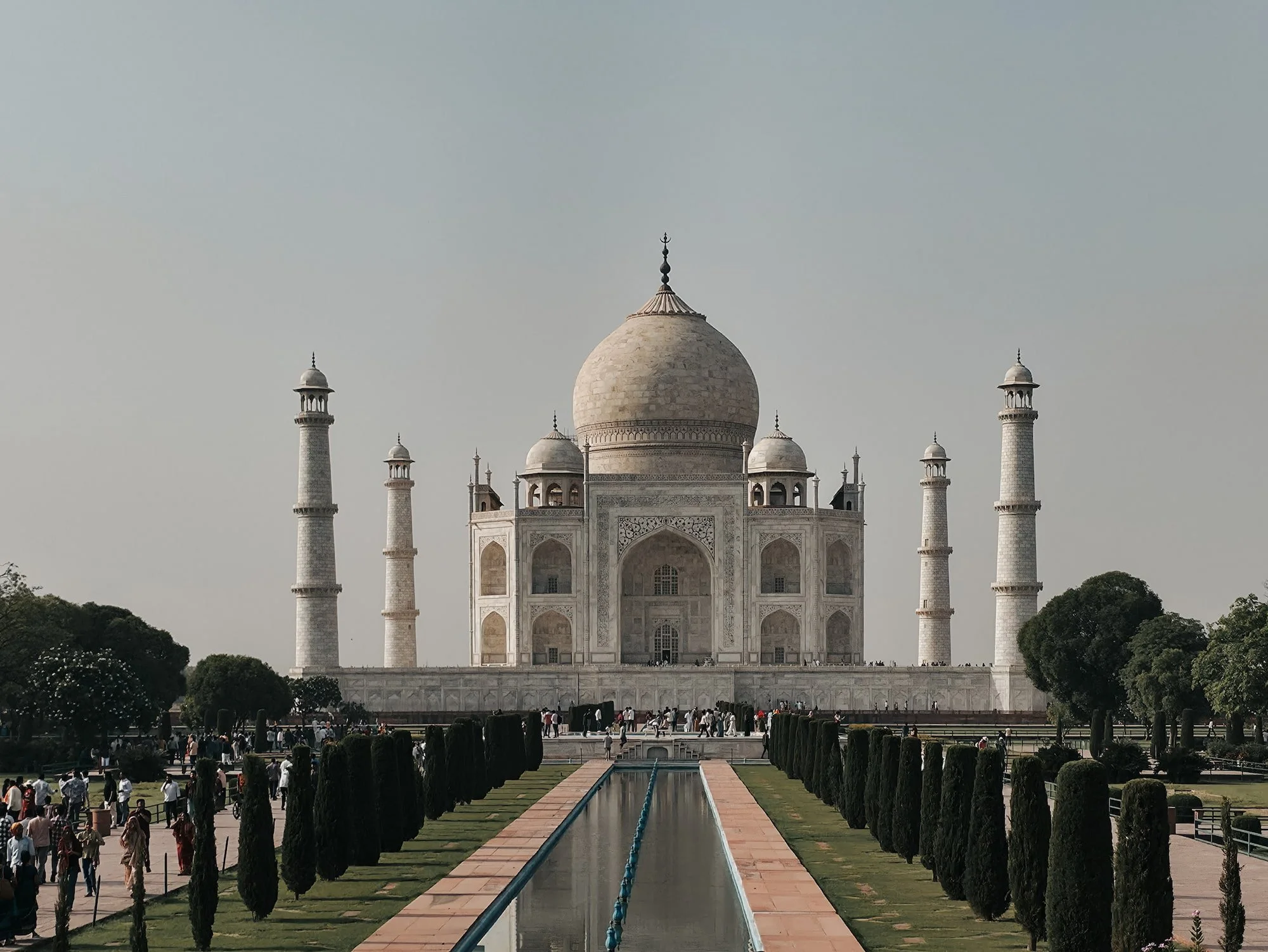 Frontal view of the Taj Mahal in Agra, India with the reflecting pool and gardens