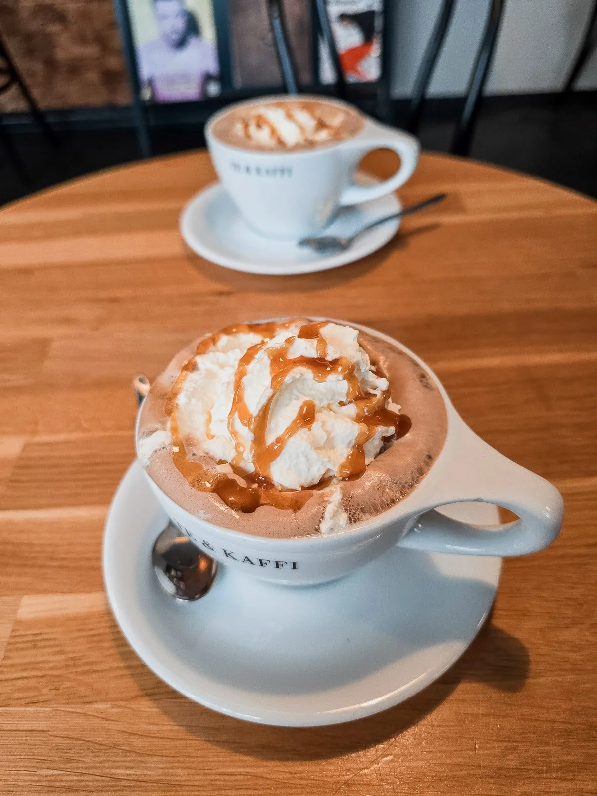 Coffee topped with whipped cream and caramel at a café in Reykjavík, Iceland
