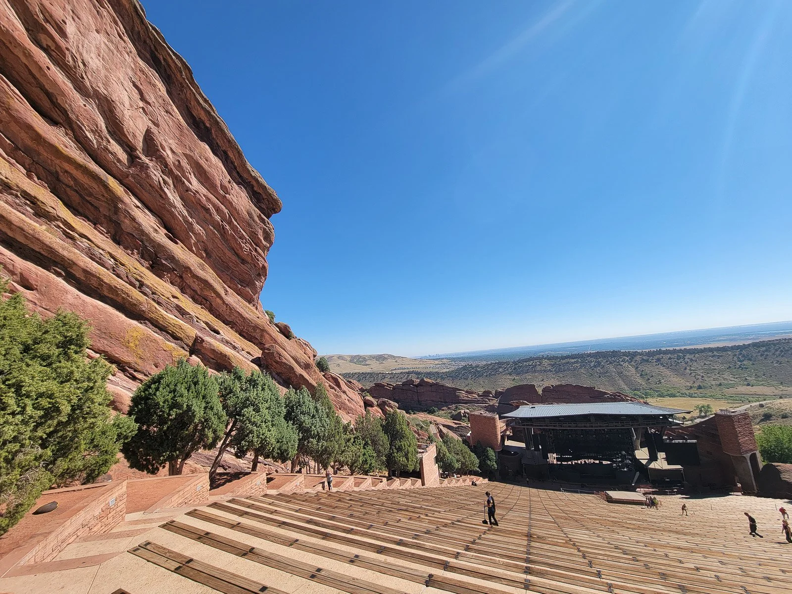 Daytime view across the seating and stage at Red Rocks Amphitheatre in Colorado