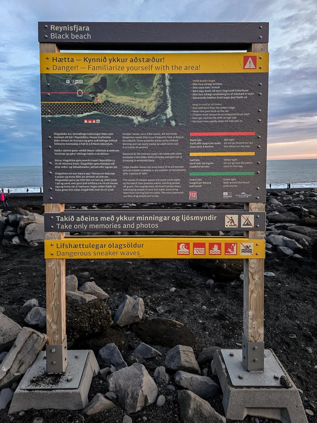 Sneaker wave safety information sign at Reynisfjara Black Sand Beach in Iceland