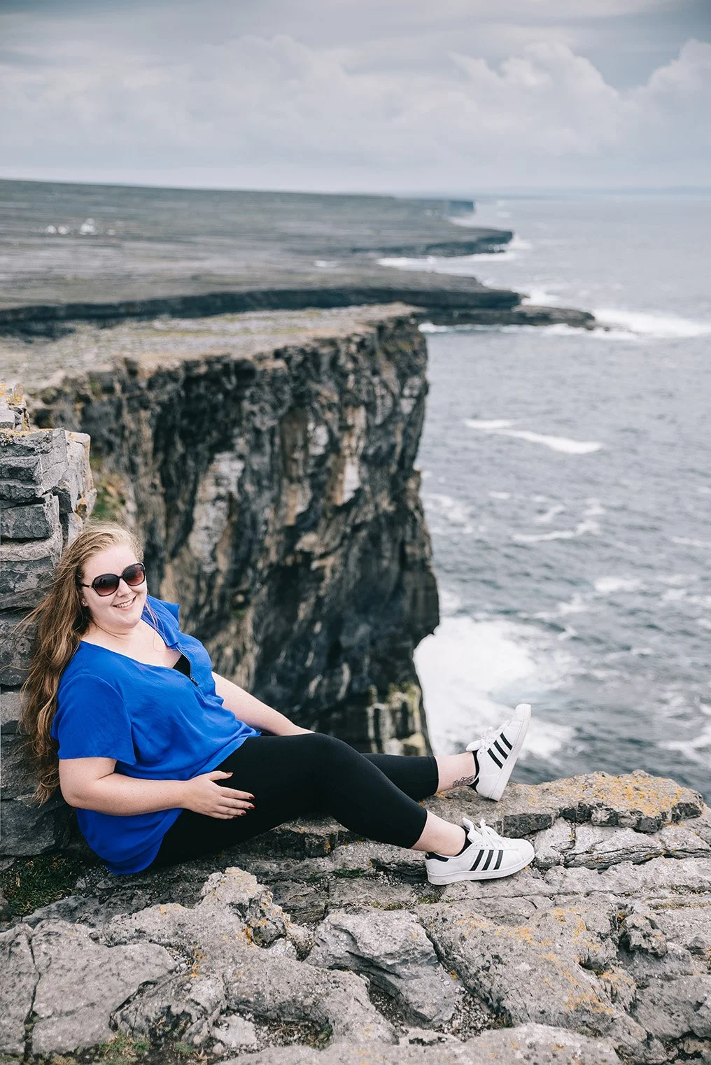 karen posed on cliff edge in inishmore aran island