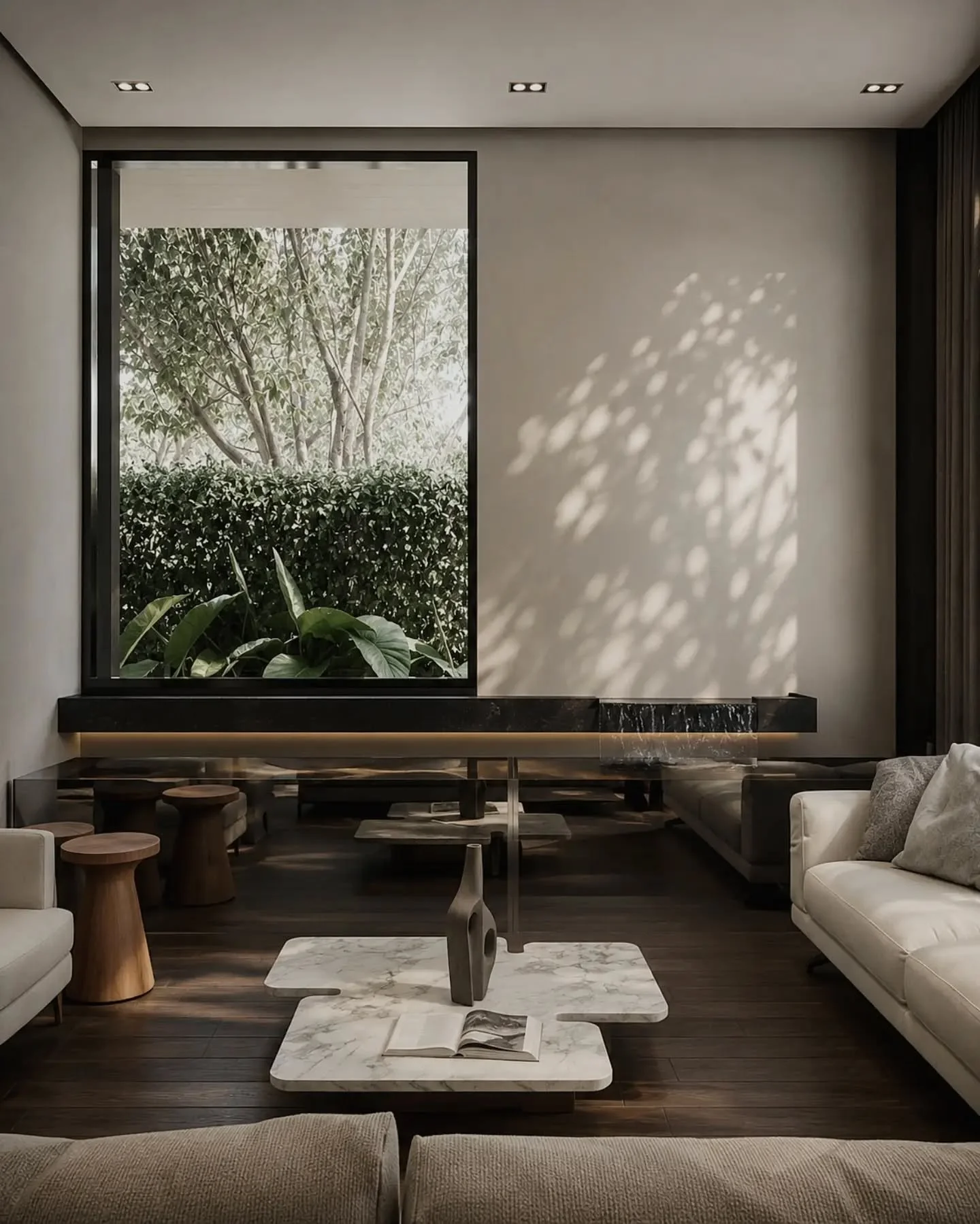 The koi pond in the living room quietly reflects the way the homeowner connects with nature. A minimalist waterfall and one asymmetrical window quietly complete the composition. Oftentimes, simplicity is enough to give a space its own character.

Cin
