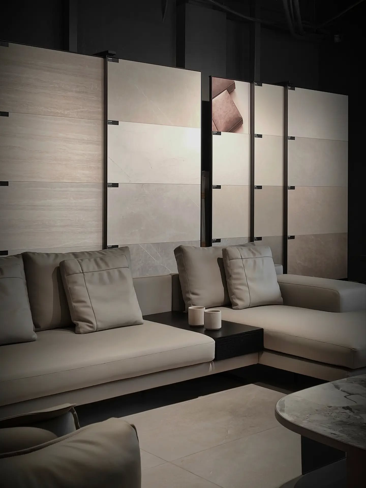The interior is deliberately restrained, allowing the tiles, furniture, and light to remain the focus without visual noise. The space becomes a quiet setting where each element can be experienced and appreciated. A showroom does not need to compete w