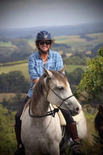 Melissa riding on the farm at Sisters Creek