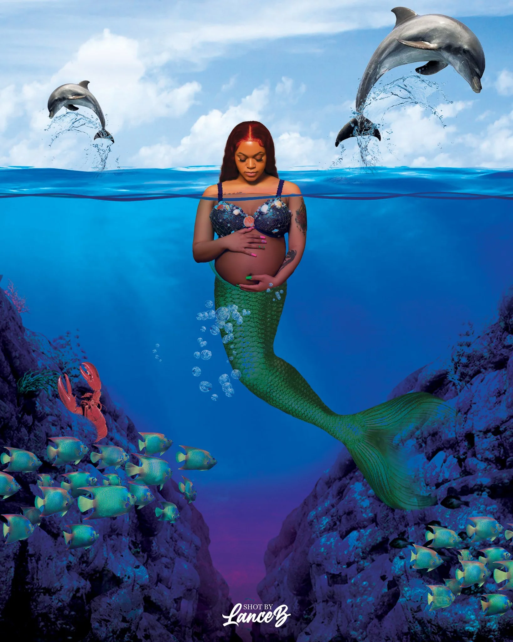 A woman with a mermaid tail underwater, holding her pregnant belly, with dolphins jumping in the background and fish swimming around coral reefs.