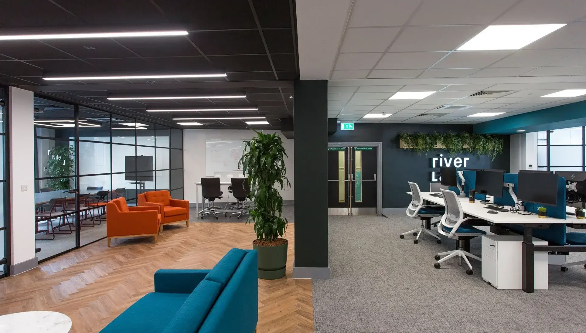 River lane office with wall mounted glass whiteboard.webp