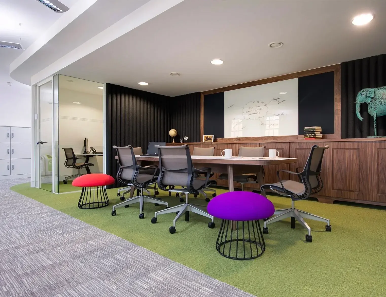 Office with purple and red coloured stools.webp