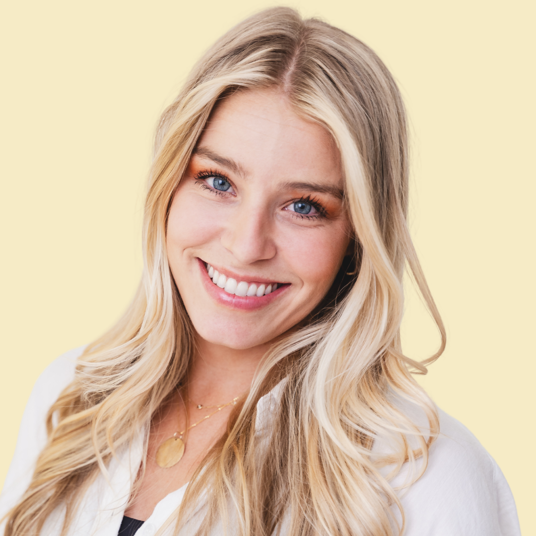 Hailey Baitinger CEO, FOUNDER Designbee Agency, blonde hair girl with her hair down wearing a white top against a light yellow background