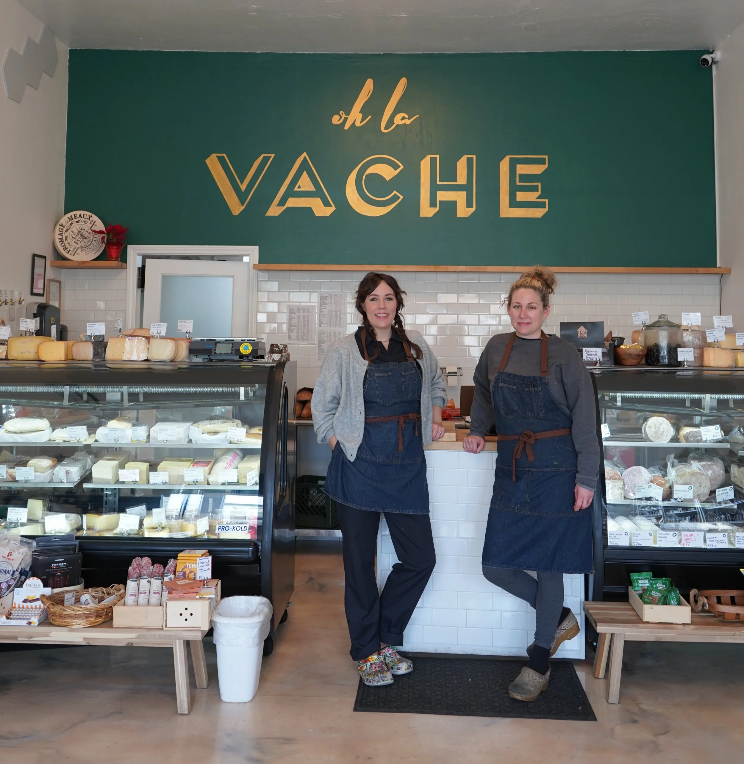 Erika & Jessica in front of the counter