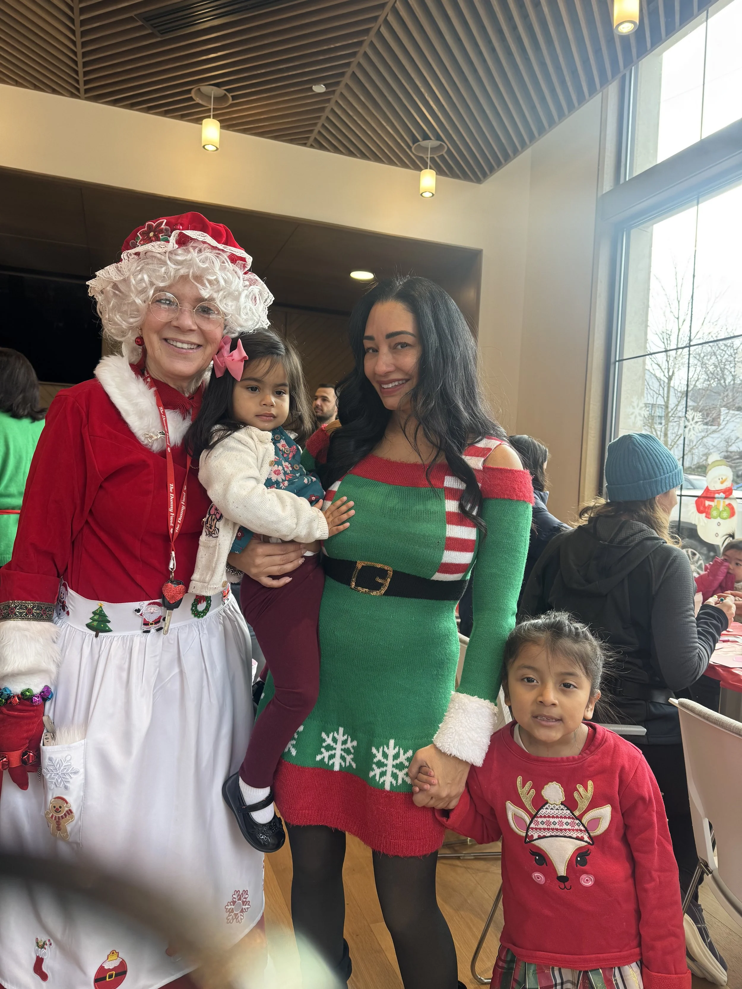 Mrs. Claus and Elf 2026
