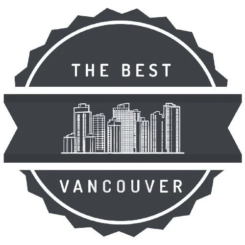 A circular badge with a city skyline at its center, featuring high-rise buildings, and text that reads "The Best Vancouver".